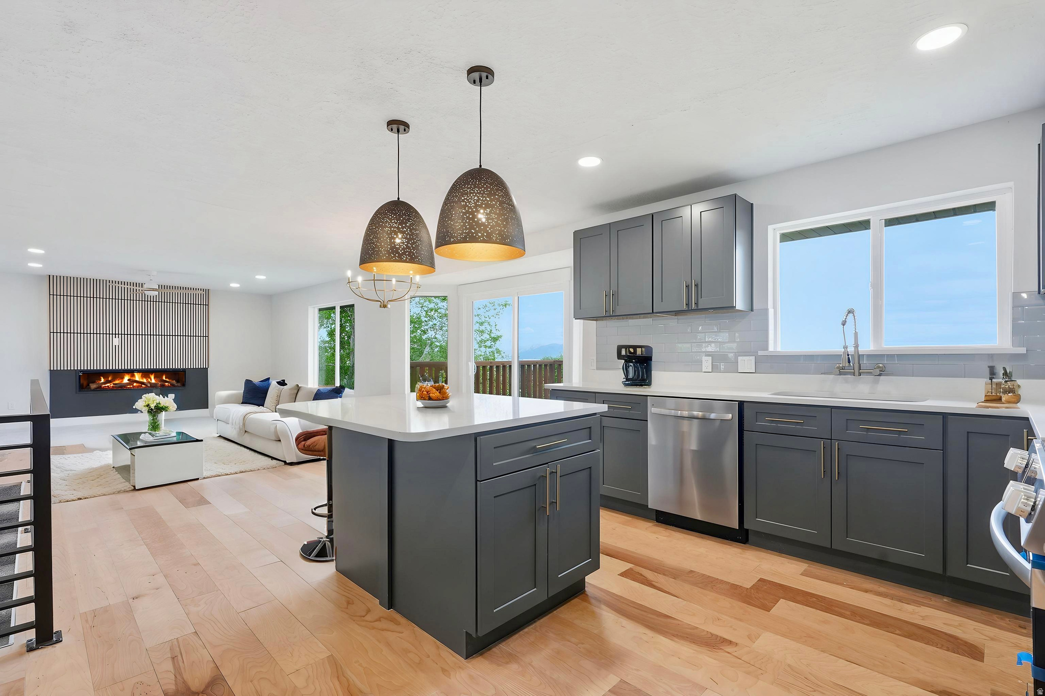 BACK ON THE MARKET!!  $15,000 PRICE REDUCTION!!!  GET A LOWER INTEREST RATE - SELLER IS OFFERING a 2:1 BUYDOWN or $19,000 toward CLOSING COSTS when you use our preferred lender ...****...    Beautifully REMODELED HOME with an ADU / MOTHER-IN-LAW APARTMENT, a 4-CAR GARAGE, and NO HOA!!!   This beauty was COMPLETELY REMODELED with HIGH-END FINISHES and attention to detail.    BRAND NEW Flooring, Paint, Light Fixtures, and Appliances are just a few of the many updates.    The 4-CAR GARAGE is huge, offering plenty of space for cars, storage, or toys   The Great Room and Kitchen are thoughtfully designed, perfect for everyday living and hosting guests.    The Primary Bedroom is a show-stopper with a luxurious, spa-like ENSUITE BATHROOM   The ADU is a DAYLIGHT WALKOUT with a SEPARATE ENTRANCE and its own LAUNDRY.    Enjoy MAGNIFICENT VIEWS of Utah Valley right from your windows .   LOCATION is unbeatable!!! Just 3 minutes to SLATE CANYON, walking distance to Spring Creek Elementary, and less than 10 minutes to Downtown Provo and BYU.    This is the home you've been looking for - come see it today!  Information and measurements are provided as a courtesy, photos are virtually staged. Buyer is advised to obtain their own measurements and verify all information.