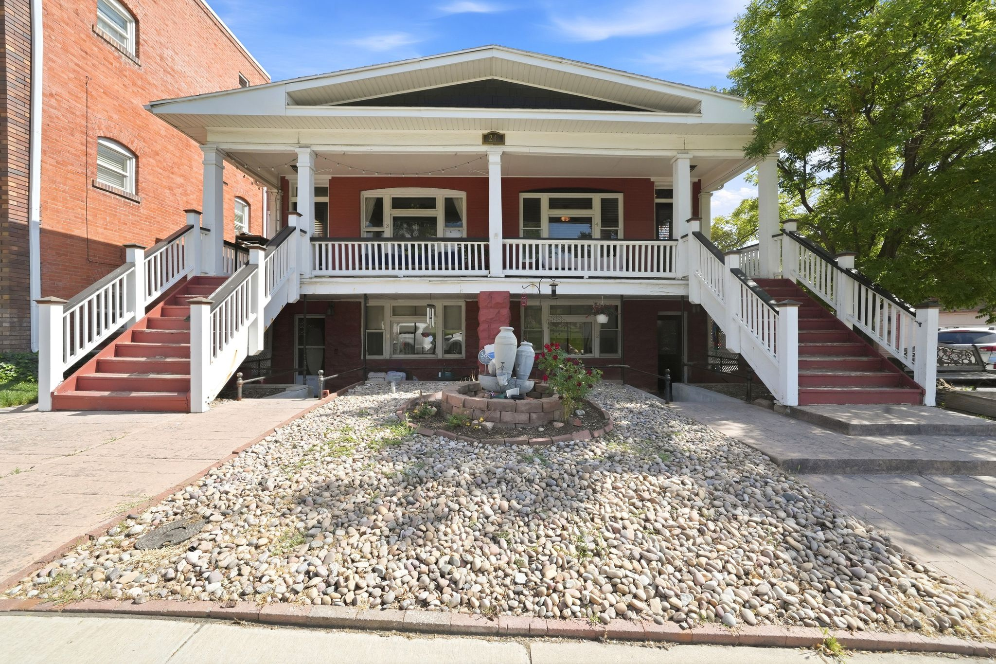 Enjoy the best of Capitol Hill living with beautiful park views and downtown just steps away. This charming condo blends historic character with modern updates, featuring exposed brick accents, updated lighting, new LVP flooring in the bedroom, and a bright kitchen with granite countertops. All appliances are included for true move-in-ready convenience! Relax on the covered front porch overlooking the green space, and enjoy the added benefit of a dedicated 1 car garage plus street parking. A rare opportunity to own a move-in-ready home in one of Salt Lake City's most walkable and sought-after neighborhoods.