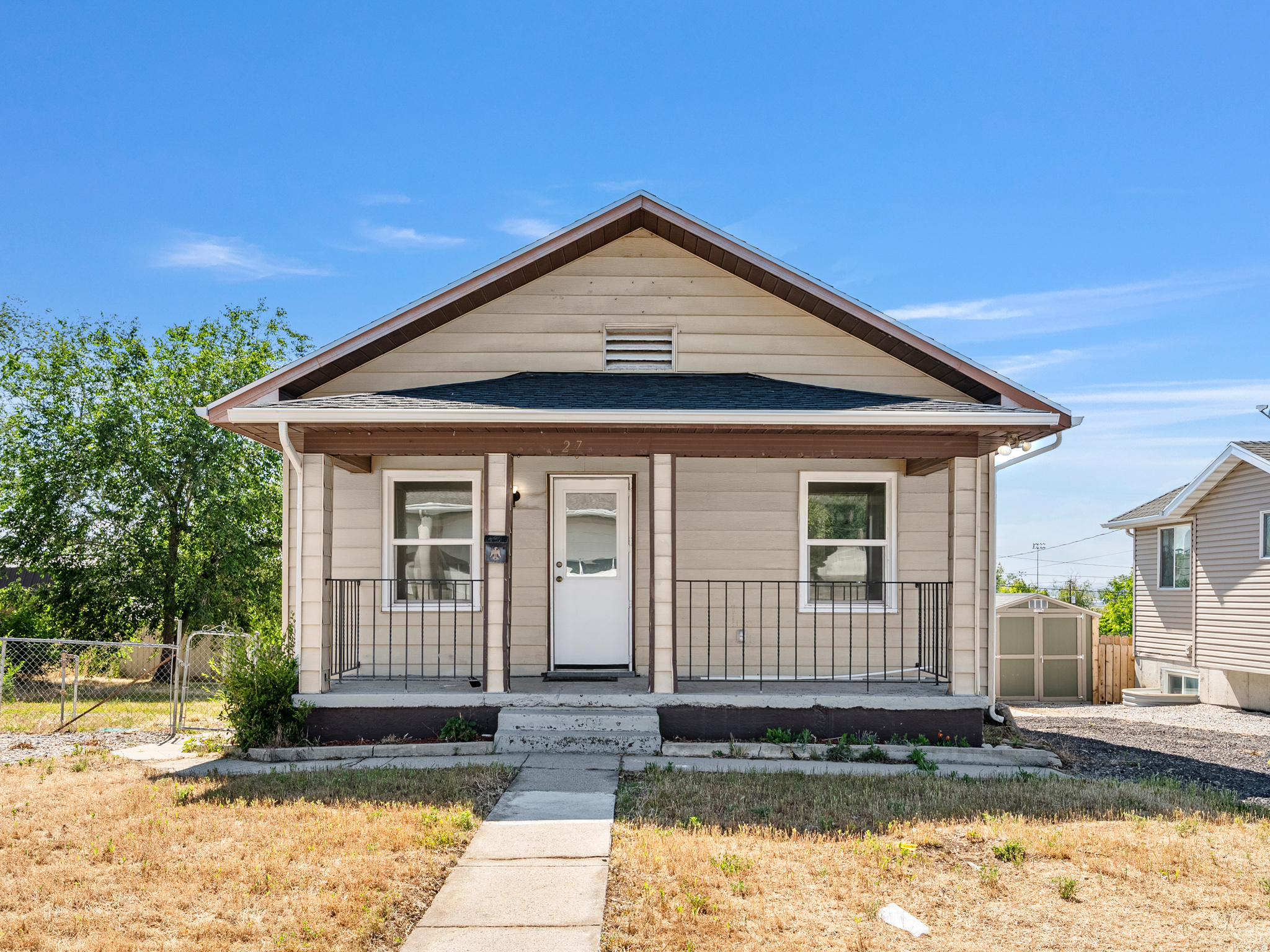 Charming 1919 home that has been extensively updated while maintaining its character. This 3-bedroom, 1.75-bath home features a custom kitchen with granite countertops, updated cabinetry, and all major appliances included. Numerous improvements throughout the home include updated electrical, updated windows, high-efficiency furnace and A/C, and 50-year shingles for added peace of mind. Functional layout with two family rooms, including additional living space in the basement. Spacious backyard with room to enjoy, garden, or personalize. Great opportunity for buyers looking for a home with major updates already completed while still offering affordability and character.