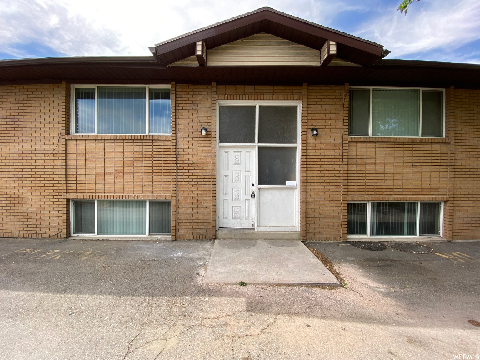 Don't miss this rare chance to acquire a true legal conforming 4-plex with assumable seller financing at 5.5%. All four units are 2BD/1BA at 832 sq ft each, generating $6,135/month in gross rental income. The seller financing is an all-inclusive trust deed on an existing note amortized over 30 years with a balloon due October 31, 2030 - a qualified buyer with approximately $428,000 down steps directly into the note and locks in below-market financing on day one. The property has been comprehensively updated in the last three years: new roof, new furnaces and A/C units, brand new kitchens with granite countertops and soft-close cabinetry, new appliances and washer/dryers in every unit, new tile bathrooms, new electrical panels, and a full french drain. All four units have separate gas and electric meters, covered carport parking, and full laundry hookups. There is zero deferred maintenance and no capital improvements on the horizon - just clean, stable cash flow in a strong Salt Lake rental market. Always full occupancy. DO NOT DISTURB TENANTS. Make offers subject to inspection. Call listing agent prior to writing offer. Square footage per appraiser measurement - buyer to verify all information.