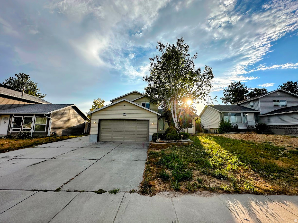 Large & Beautiful remodeled 5-Bedroom Home in a Prime Location! New paint! New Flooring! New Carpet! Updated bathrooms! New kitchen countertops! This spacious home offers the perfect combination of comfort and convenience. Ideally located near Kearns High School, the Utah Olympic Oval, freeway access, and Bangerter Highway, with easy access to schools, parks, shopping, dining, and the recreation center. Features include RV parking, a spacious two-car garage, and plenty of room for family, guests, or a home office.