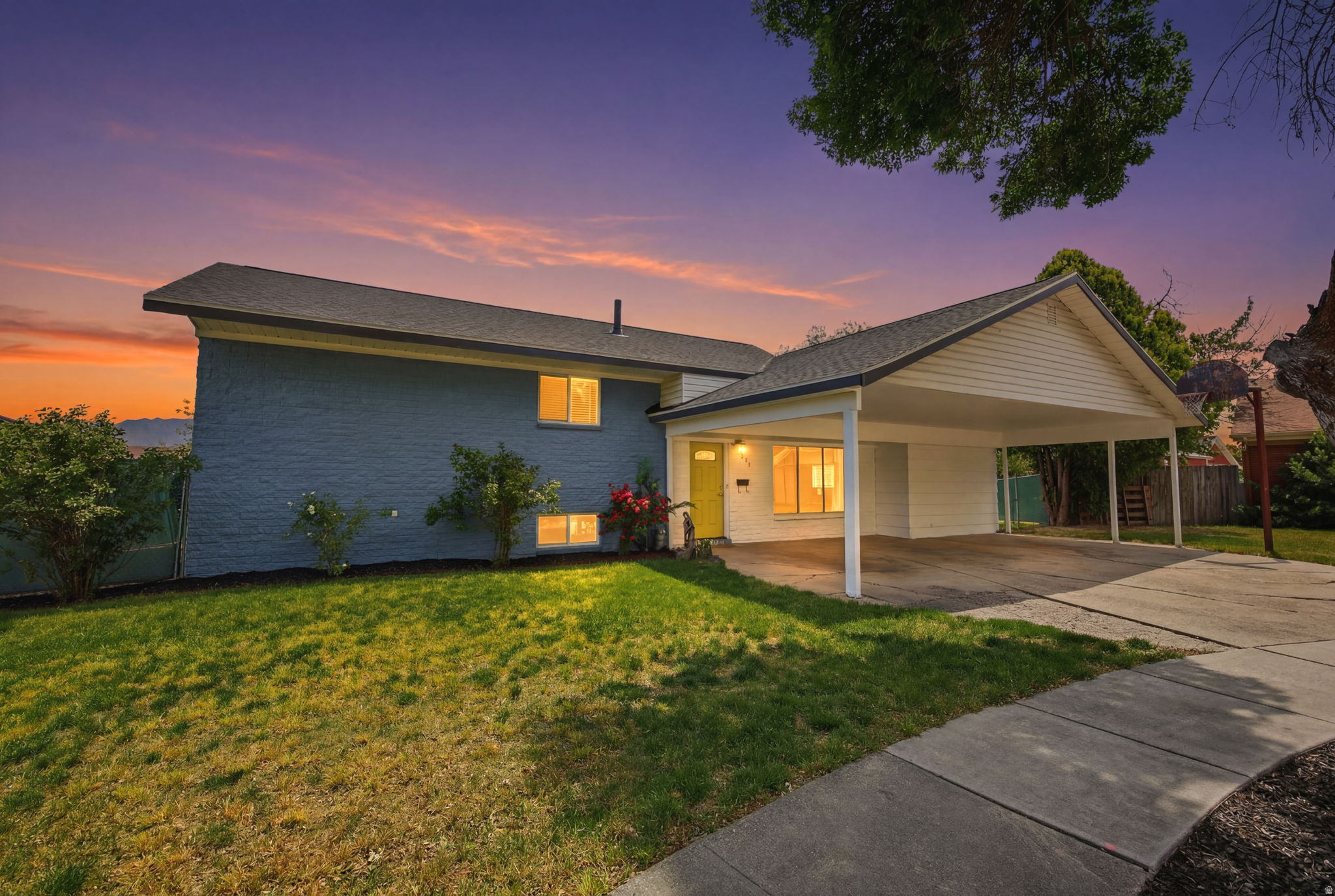 Fully updated 4 bedroom, 2.5 bathroom home tucked away in a quiet cul-de-sac in the heart of Murray! This home features an open concept main living area with beautiful updated flooring, a remodeled kitchen with modern finishes, large island, and plenty of natural light throughout. The spacious layout offers multiple living spaces, generously sized bedrooms, and a primary suite with an ensuite bathroom. Enjoy the large backyard with covered patio, mature trees, and plenty of space to relax or play. Newer roof replaced in 2020. Conveniently located near parks, schools, shopping, dining, and freeway access. Move in ready and a must see!