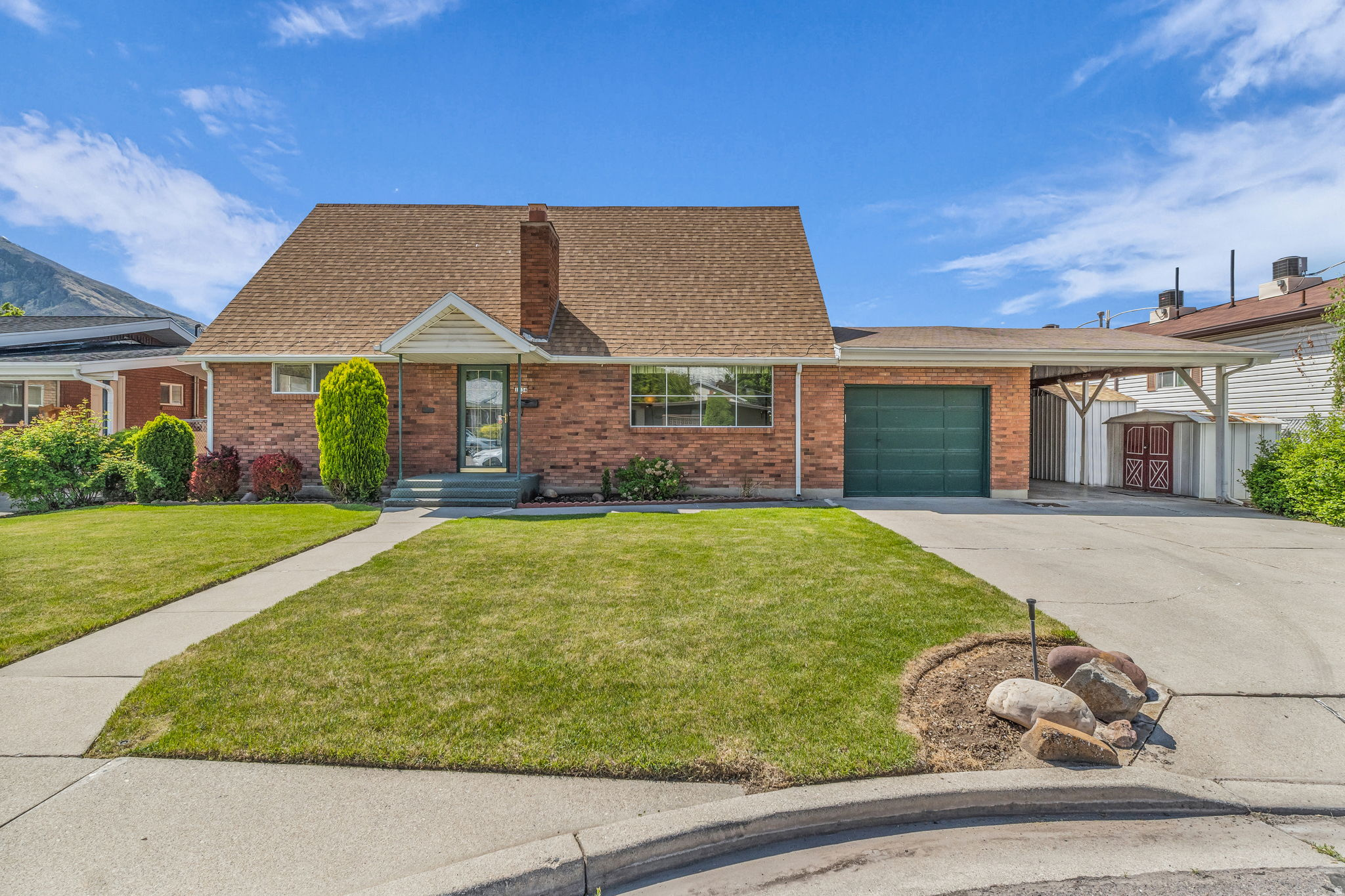 This Provo gem is the kind of place buyers dream about - full of character, move-in ready updates, and an unbeatable location in a quiet cul-de-sac (less than one mile to BYU, hiking trails and downtown Provo). Built in 1962 and lovingly cared for by just one owner, this quality, all-brick home blends vintage charm with modern comfort.  Inside, you'll find bright, welcoming living spaces including a generous living room with a custom brick fireplace, a spacious family room perfect for game days and holidays, and a kitchen with warm original cabinetry and unique built-ins you won't find in cookie-cutter homes. Fresh paint, new flooring, updated electrical switches and outlets, and an energy-efficient furnace make this home feel fresh and ready for its next chapter.  The flexible layout offers four bedrooms plus 1.5 bathrooms, providing  room for guests, a home office, or creative space. Outside, enjoy a fully fenced backyard with mature fruit trees, perennial flower beds, garden space, and a shaded patio perfect for hosting summer BBQs. Bonus workshops and storage sheds provide extra space for bikes, hobbies, outdoor gear, or side projects.    One of the standout features? The unobstructed views of the 'Y' - a true Provo classic.  Whether you're a college student looking to stop renting, a family wanting space to grow, or someone searching for a home with personality, this one is worth a look. Schedule your personal tour of this charming home today, or join us at an open house Saturday, 5/30, from 11am to 2pm.   *Square footage taken from County records; buyer advised to verify.