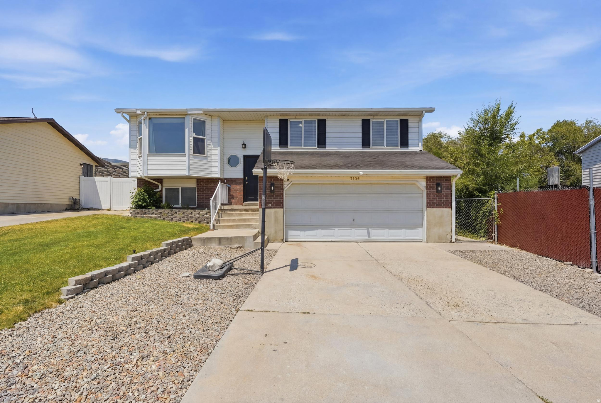 Well-maintained 5-bedroom, 2-bath split-entry home on a cul-de-sac! Features a fully finished daylight basement, attached 2-car garage with workbench, fenced yard, fruit trees, storage shed, and convenient access to parks, shopping, and commuter routes.