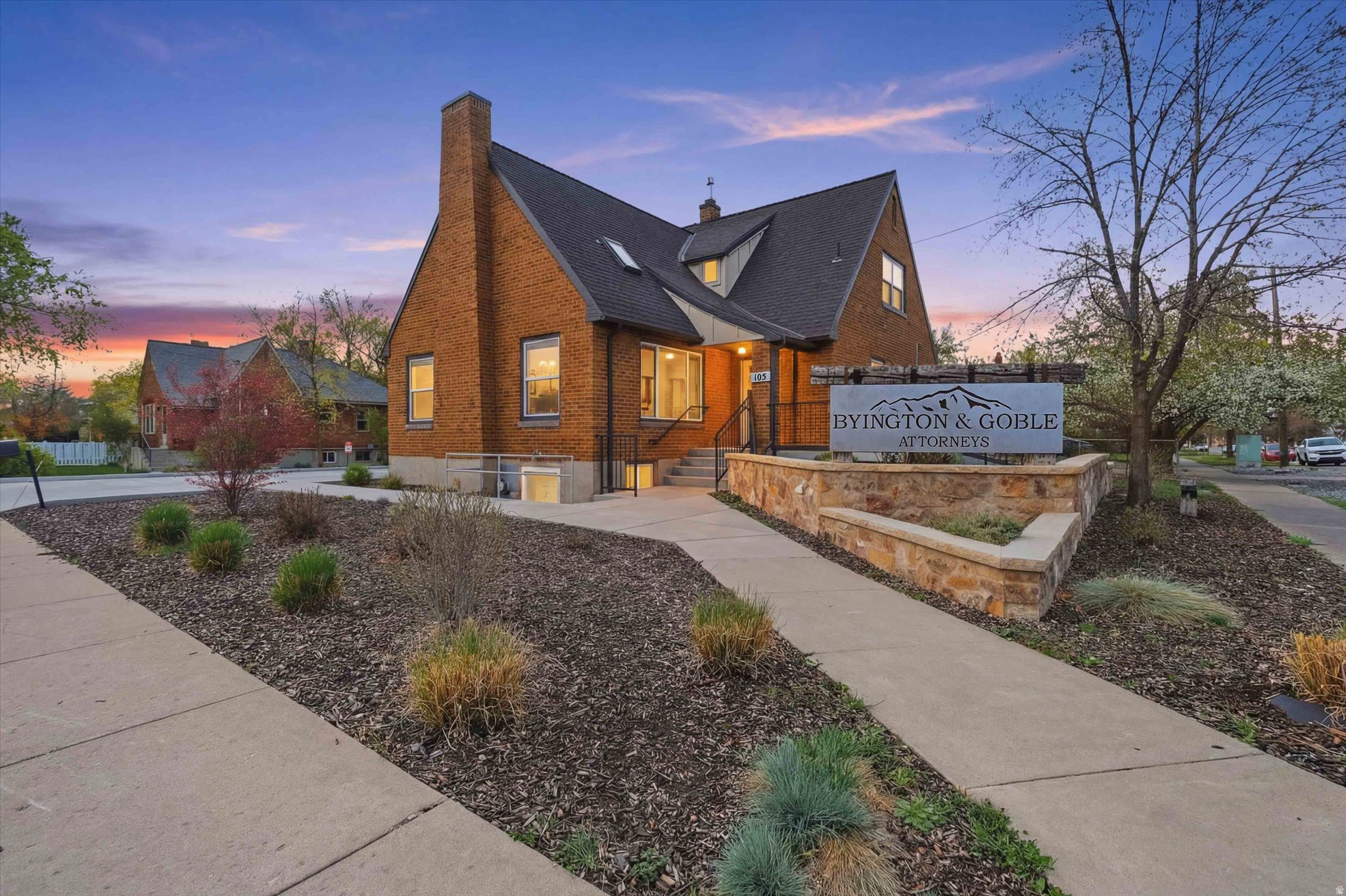 This beautifully remodeled three-story commercial building blends timeless character with modern functionality, located in downtown Logan's Historic Civic and Commercial District. Thoughtfully updated throughout, it retains vintage charm with features like an impressive staircase and original wood flooring (lightly sanded and resealed). The ADA-accessible main level is ideal for professional use, offering two conference rooms, two kitchens, three bathrooms, and 78 private offices for flexible business needs. Major upgrades include a new roof (2021), updated electrical (2022), new HVAC system, and all-new landscaping (2022). Efficient boiler system performs exceptionally well in winter. High-traffic location with excellent visibility and 7 on-site parking stalls for added convenience. A rare, move-in-ready opportunity in a prime downtown setting.