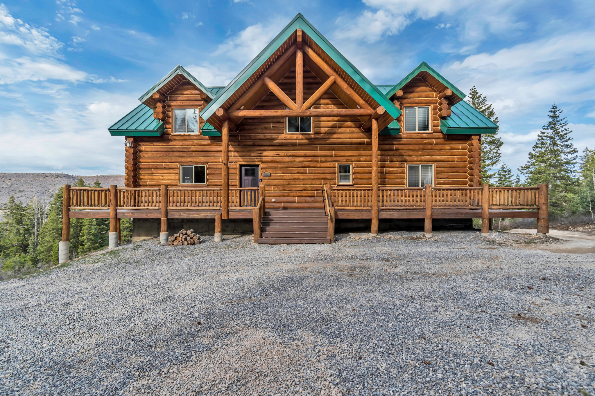 Stunning cabin retreat on 14 private acres surrounded by trees and abundant wildlife, with beautiful views out every window! This exceptional property offers the perfect blend of seclusion and year-round accessibility, with roads plowed up to the driveway and a treated road base to keep conditions clean and mud-free. Enjoy the outdoors from the expansive wrap-around deck, ideal for relaxing or entertaining.  Inside, you'll find high-end finishes throughout, including granite countertops and a spacious, well-designed layout with 3,264 sq ft of living space. The home can be sold furnished, making it a true turnkey getaway. Stay connected with Starlink internet while enjoying the peace of mountain living.  Outdoor enthusiasts will love the easy access to nearby blue-ribbon fisheries, including Strawberry and Scofield Reservoirs, as well as endless opportunities for 4-wheeling and side-by-side adventures. Conveniently located approximately 1 hour from Provo Airport and 1.5 hours from Salt Lake City Airport, with shopping and amenities-including Costco-just 40 minutes away. Additional features include a heated 2-car garage.  Experience the perfect combination of privacy, recreation, and comfort-your ideal mountain escape awaits!  The certificate of occupancy issues October 2023 despite it saying its built in 2021.  Please do not drive up without appointment. Buyer to verify all.