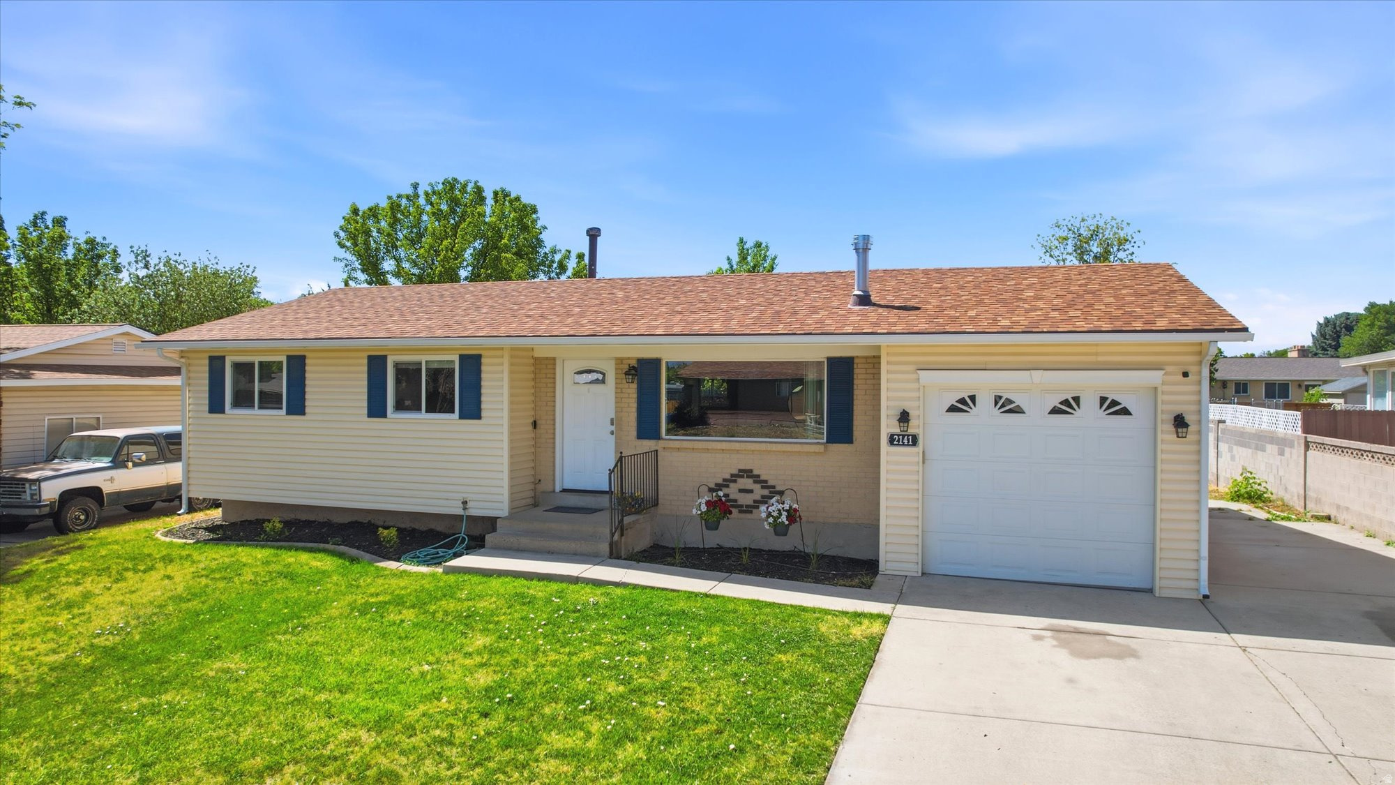 Updated West Jordan rambler featuring 4 bedrooms, 2 bathrooms, (could easily be 6) bedrooms) and just under 2000 sq ft of living space on a spacious 0.20-acre lot with RV parking. This move-in ready single-family home offers an updated kitchen with knotty alder cabinets and Corian countertops, remodeled bathroom with soaker tub and rain shower, and a cozy gas fireplace added in 2021. Major updates include paid-off SOLAR PANELS installed in 2021, new furnace 2024, new basement carpet, rain gutters, exterior trim, and shutters in 2024. Don't forget a fresh coat of paint!!! Finished basement includes a newly completed 4th bedroom plus potential for a 5th & 6th bedroom or additional flex space. Enjoy ample storage with two sheds, extra-long attached garage, basement storage, and large fenced backyard, mature trees, patio, and sprinkler system. Additional features include central air, forced air gas heat, updated flooring, video doorbell, and full landscaping. Conveniently located near schools, parks, shopping, and commuter access in West Jordan with FHA, VA, conventional, and cash financing options available. Ideal for buyers searching for a West Jordan home with solar panels, RV parking, finished basement, updated kitchen, large yard, and multi-generational living potential.