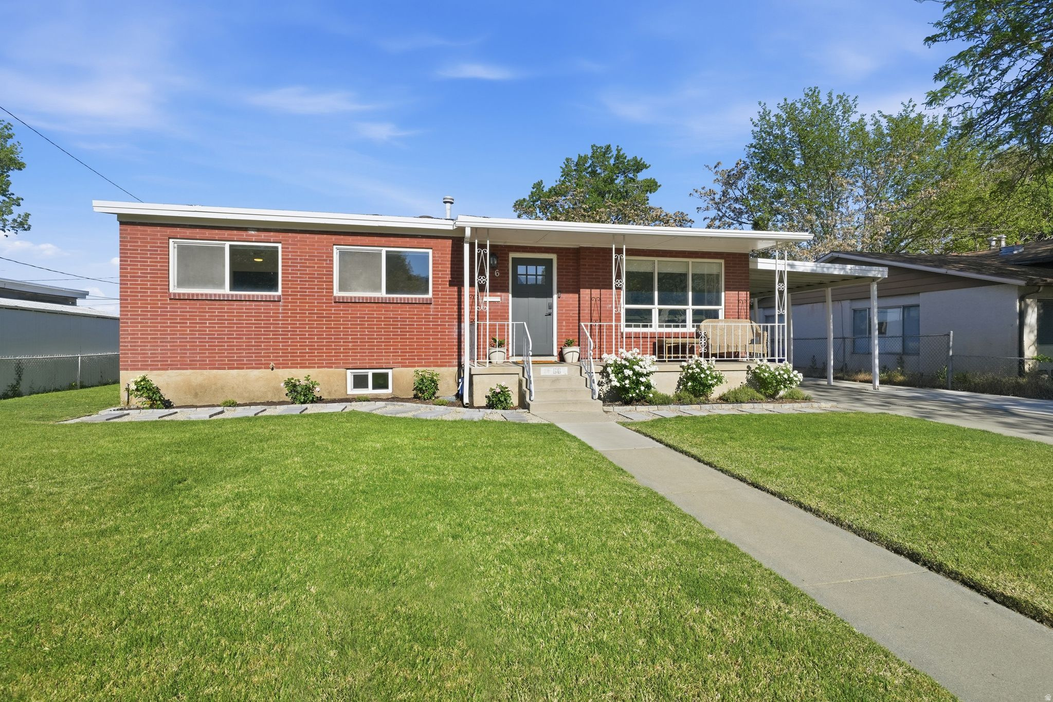 Beautifully updated 5-bedroom, 2-bath rambler offering 2,086 sq ft of comfortable living space. Extensively remodeled within the last five years with updated finishes throughout, including LVP flooring and carpet. The fully finished basement provides additional living space and flexibility for a variety of needs.  One of the standout features of this home is the covered backyard patio complete with built-in lighting, ceiling fan, and TV setup-perfect for relaxing or entertaining year-round. The backyard also includes an updated shed and playground area with rubber tire surfacing.  The home features both a front entrance and separate side entrance, offering convenient access and potential for a future basement suite or mother-in-law setup with a private entrance.  Owner/Agent  Seller is a licensed Utah real estate agent. Buyer to verify all information, including square footage and acreage, to buyer satisfaction.