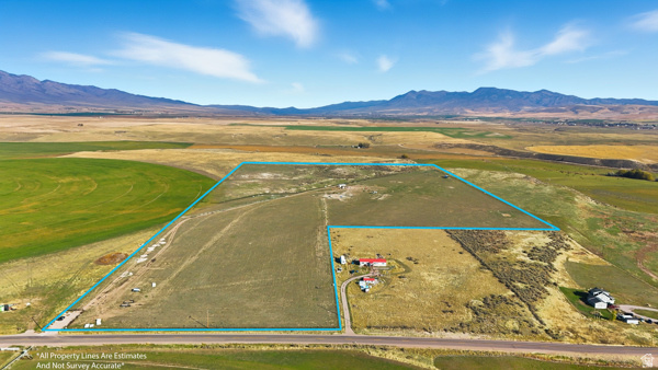 Aww the good life!! Are you ready to have a Homesteaders Farm with 65 acres, 2 septic systems, 3 RV connections, Well installed and 800 amp Electrical service? It's Completely fenced/cross fence on property, Unbelievable Mountain Views, has been used as pasture for cows and goats, recreational property. Seller finance available. 520 feet of hard surface of Hawkins Road, 3 min west of I-15, Wildlife visits, Mule deer, Moose, Pheasants upland game, Cutthroat & rainbow trout fishing at nearby reservoirs. Bring your Livestock or horses and enjoy the rural, open country land.