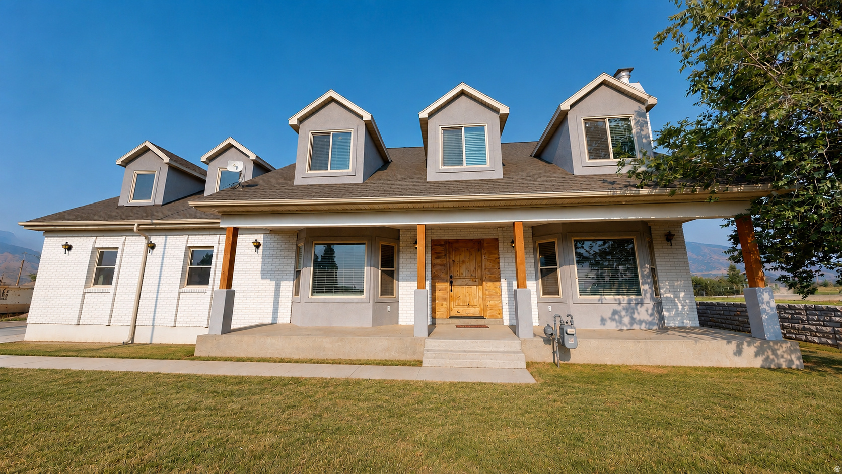 Come see this beautifully remodeled 5-bedroom, 4-bath Spanish Fork home offering nearly 4,000 sqft on a rare 0.44-acre lot! The Seller is offering $10,000 in Seller Paid Closing Costs to help buy down a low monthly payment. Extensively updated throughout, this home features an open-concept floor plan, a large kitchen with a large walk-in pantry, a HUGE Master Suite with four closets, wood burning stoves, updated flooring, fresh paint, stylish finishes, a newer roof, main-level laundry, EV charging, and a spacious 3-car garage. The finished basement features a complete mother-in-law apartment with its own private entrance through the garage, a full kitchen, bedroom, full bathroom, family room, and a laundry area. And you will LOVE the oversized basement storage room. Enjoy the flexibility of nearly half an acre with plenty of room for entertaining, gardening, recreation, or future expansion. Landscaping will be improved, and a new driveway will be installed. Details about landscaping installation is negotiable. The Seller is flexible. Conveniently located near schools, shopping, restaurants, and freeway access. Driveway scheduled for completion in July. Ai Photos show approximately what final landscaping and driveway may look like. Don't miss this opportunity to own a beautifully updated home with space to live, grow, and enjoy! Square footage figures are provided as a courtesy estimate only and were obtained from a CubiCasa measurement. Buyer is advised to obtain an independent measurement. Seller is motivated. Bring us an offer!!
