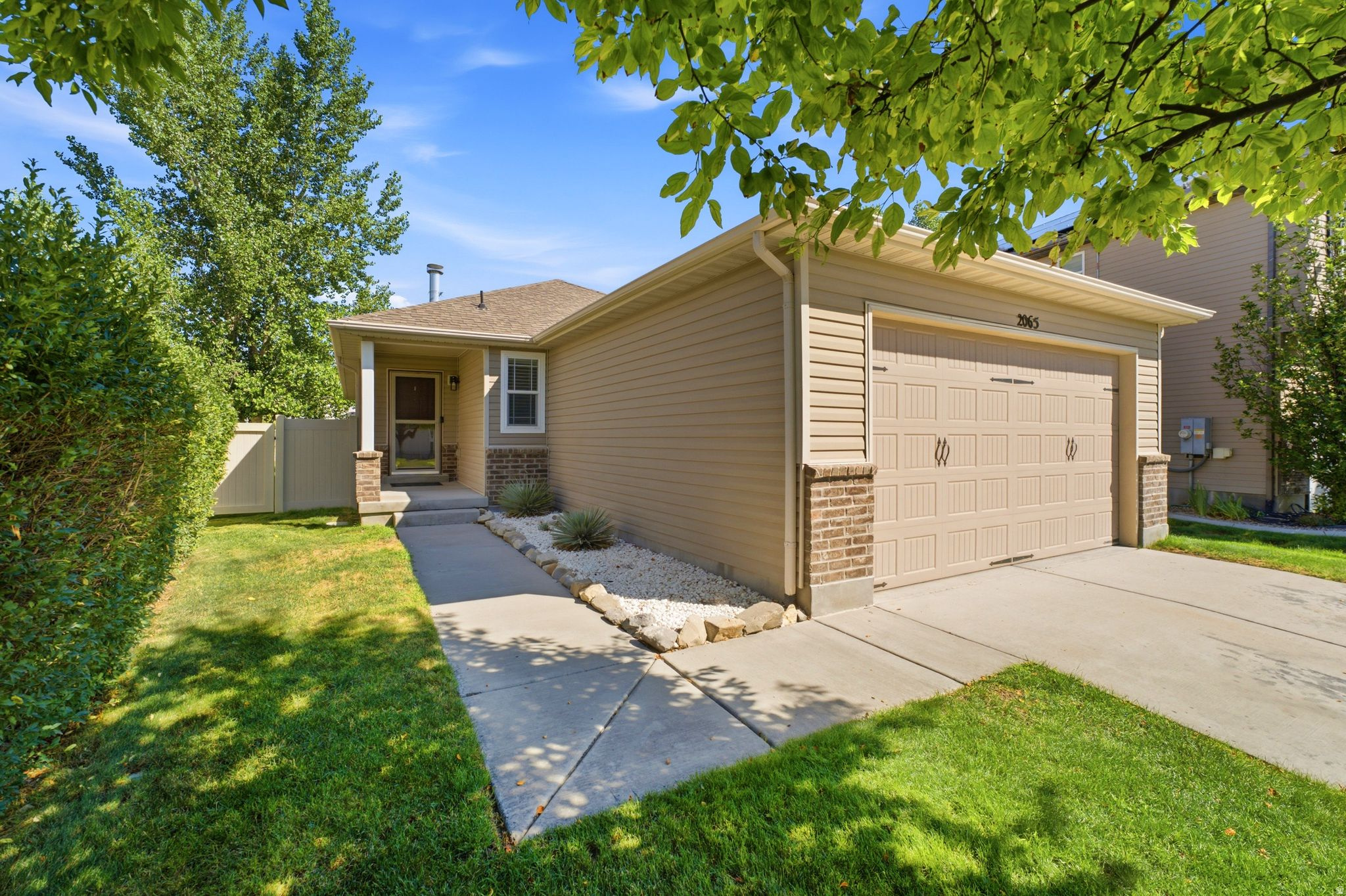 Don't let the front faade fool you-this home lives BIG, offering over 3,000 square feet of thoughtfully updated living space. Step inside to find designer touches throughout, including brand-new LVP flooring and newer appliances, creating a fresh, move-in-ready feel. The finished basement offers a wealth of storage and flexible space, with easy potential to add one or two additional bedrooms to suit your needs. Outside, the expansive backyard is a rare find-complete with direct road access through a gated entry, perfect for storing RVs, trailers, or toys, along with a large metal shed and high-quality metal fencing throughout. The garage is equipped with two 220V outlets, ideal for a workshop, EV charging, or hobbyist projects, and a water softener adds everyday convenience. No need to buy any appliances or blinds - everything is included in this home! Enjoy raised planter boxes for your garden ambitions, all while backing up to the mountains for endless hiking and biking, yet just minutes from city center shopping, dining, and entertainment. This is a rare blend of space, function, and location-schedule your showing today!
