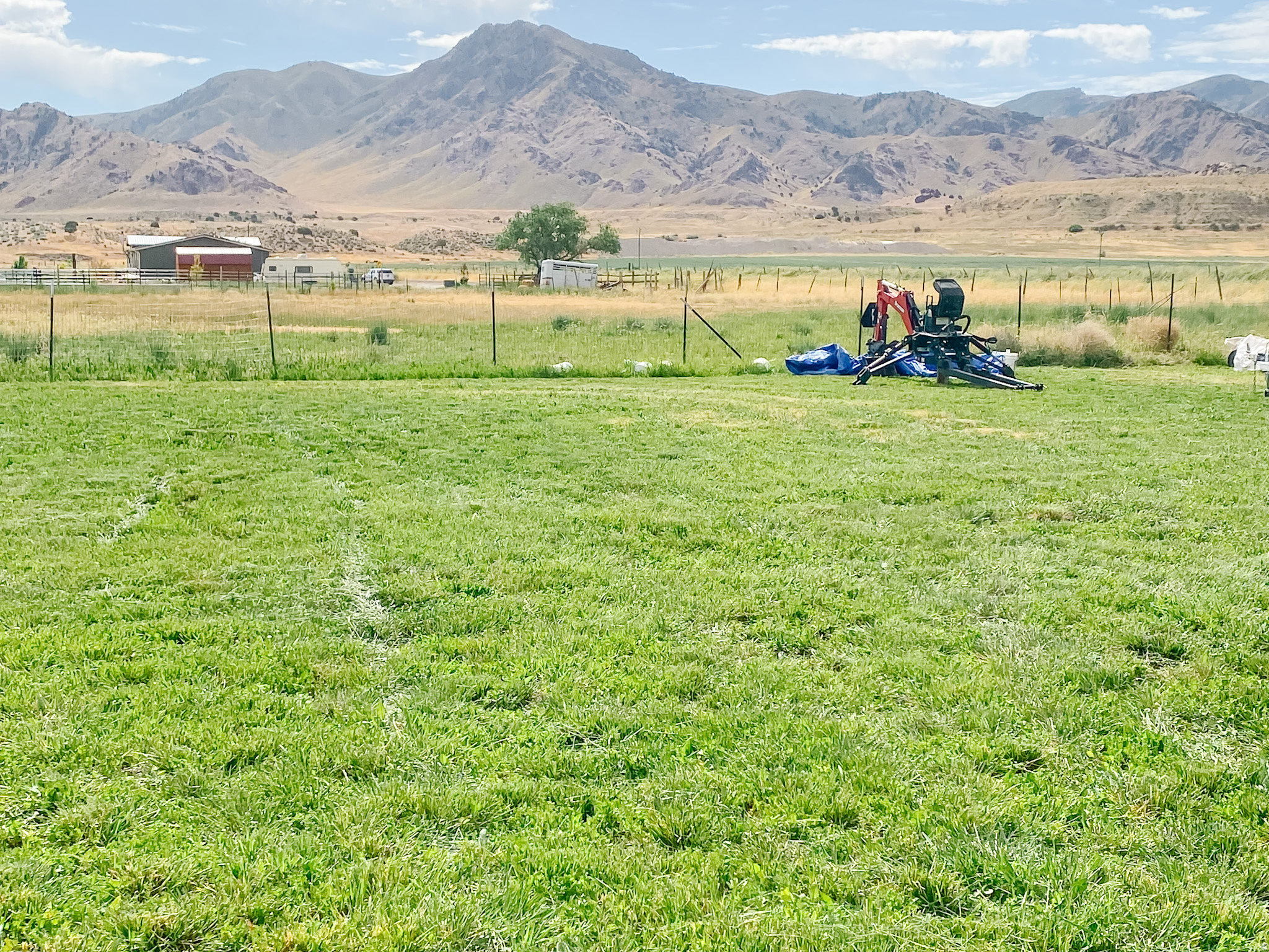 1.50 acre, corner, flat lot, with mountain views! This is the perfect spot to build your dream home out in the quiet country. Property highlights: State approved Highway 125 access, culinary water tap and meter installed, power available nearby, 2 water shares, 1 acre fully fenced - ready for horses or livestock, fruit trees (peach, sweet cherry, pear, apple, nectarine and plum), tilled garden plot, raspberry and blackberry bushes. Information is deemed reliable but not guaranteed, buyer to verify all information.