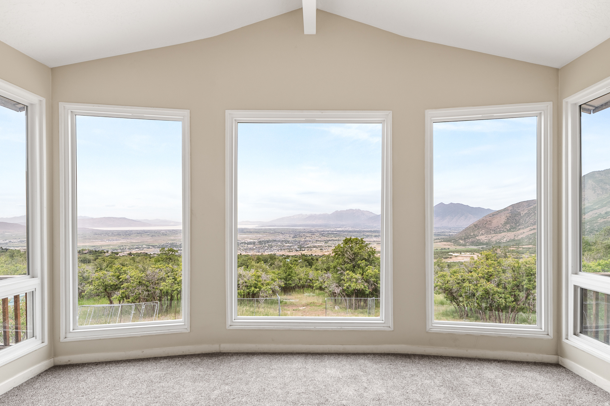 The views will amaze you! This house is situated on a 1.86 acre lot overlooking Utah lake, mountains, farms, and the fast growing Utah county. You can spend your evenings on the large wooden deck looking across the valley and enjoy this peaceful Woodland Hills neighborhood.   Buyer and Buyer's agent to confirm and verify all information is correct and accurate. Square footage figures are provided as a courtesy estimate only and were obtained from previous MLS listing.  Buyer is advised to obtain an independent measurement.