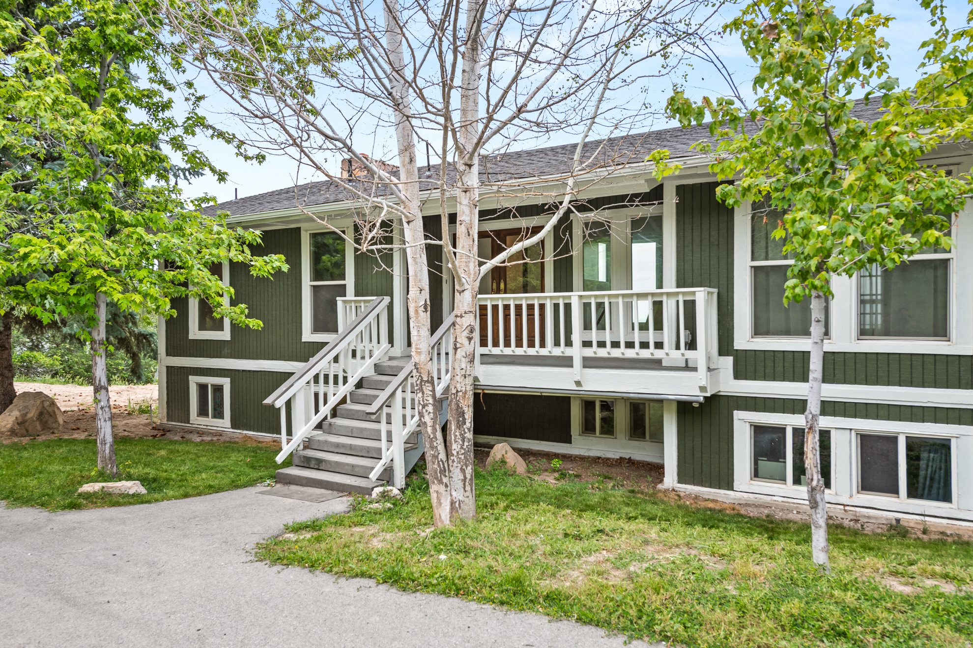 The views will amaze you! This house is situated on a 1.86 acre lot overlooking Utah lake, mountains, farms, and the fast growing Utah county. You can spend your evenings on the large wooden deck looking across the valley and enjoy this peaceful Woodland Hills neighborhood.   Buyer and Buyer's agent to confirm and verify all information is correct and accurate. Square footage figures are provided as a courtesy estimate only and were obtained from previous MLS listing.  Buyer is advised to obtain an independent measurement.