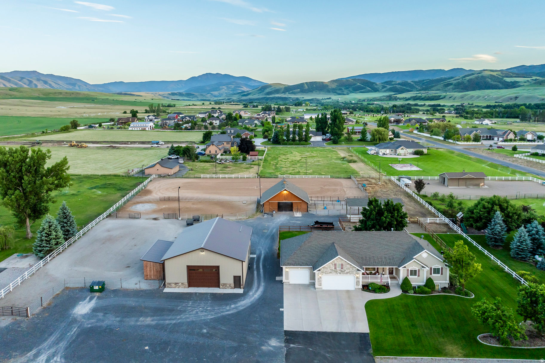 Welcome to your private equestrian retreat in beautiful Paradise, Utah. With over two acres of usable land, this property offers the space, well organized setup, and scenery every horse-loving family dreams of. The updated home showcases granite countertops, new paint, and new flooring throughout-creating a comfortable and inviting gathering place after a day in the saddle. Outside, you'll find a 40x48 insulated shop with 220 power and heat, perfect for projects and storage. The 38x36 barn features four stalls with runs, a fully enclosed tack room, and hay loft. The well lit arena and water reel makes riding possible anytime. Bring your horses, your hobbies, and your love for country living-Paradise is calling.