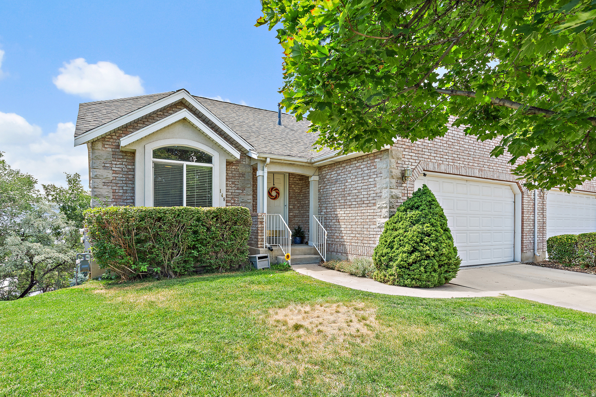 Enjoy easy living in this beautifully updated rambler-style end-unit townhome nestled in a quiet, mature tree-lined Orem community. Offering 3 bedrooms and 2 bathrooms, this home lives like a single-family residence with added privacy and a spacious feel. The primary suite features an oversized soaking tub, separate shower, and a relaxing retreat to unwind. Thoughtful updates throughout include a new roof, fresh interior paint, plantation shutters upstairs, a new upstairs bathroom vanity, and new carpet with premium luxury pad and LVP flooring installed in 2022. Additional improvements include new Ethernet wiring and a new garage door opener, providing modern convenience and peace of mind. Move-in ready and ideally located, this home combines comfort, style, and low-maintenance living. Easy access to the freeway and shopping/restaurants. Incredible lake views and mature trees from the deck.