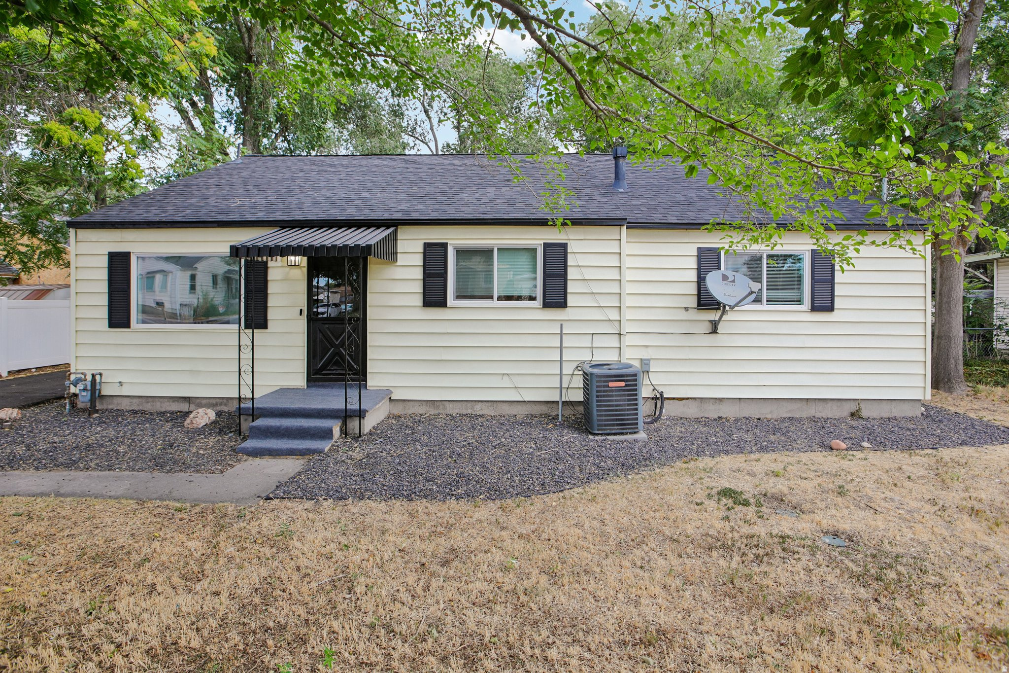 GRAND OPENING | OPEN HOUSE | JULY 11 | 10AM - 1PM | Incredible turnkey opportunity on a massive 0.34-acre lot in West Valley City! This home has been extensively updated so you can move right in with total peace of mind. All the major updates are already taken care of, including a completely replaced sewer line (3 years ago), a roof that is less than two years old, plus windows, a spacious asphalt driveway, and premium backyard turf that are all under a year old. Inside, the home shines with brand-new interior paint and brand-new blinds throughout, beautifully complementing the newer Luxury Vinyl Plank (LVP) flooring. You'll also love the fantastic bonus room hidden away in the attic-perfect for a playroom, cozy den, or extra storage. The exterior boasts great curb appeal with freshly painted outside doors. The private, expansive backyard is an absolute standout, featuring a small storage shed and a dedicated, air-conditioned detached workout room. Complete with a unique 2-car split garage, this rare find offers an unbeatable location with fast access to Bangerter Highway and I-215, making commuting to downtown Salt Lake City, local shopping hubs, and dining a breeze. Schedule your tour today! Home is sold as-is.