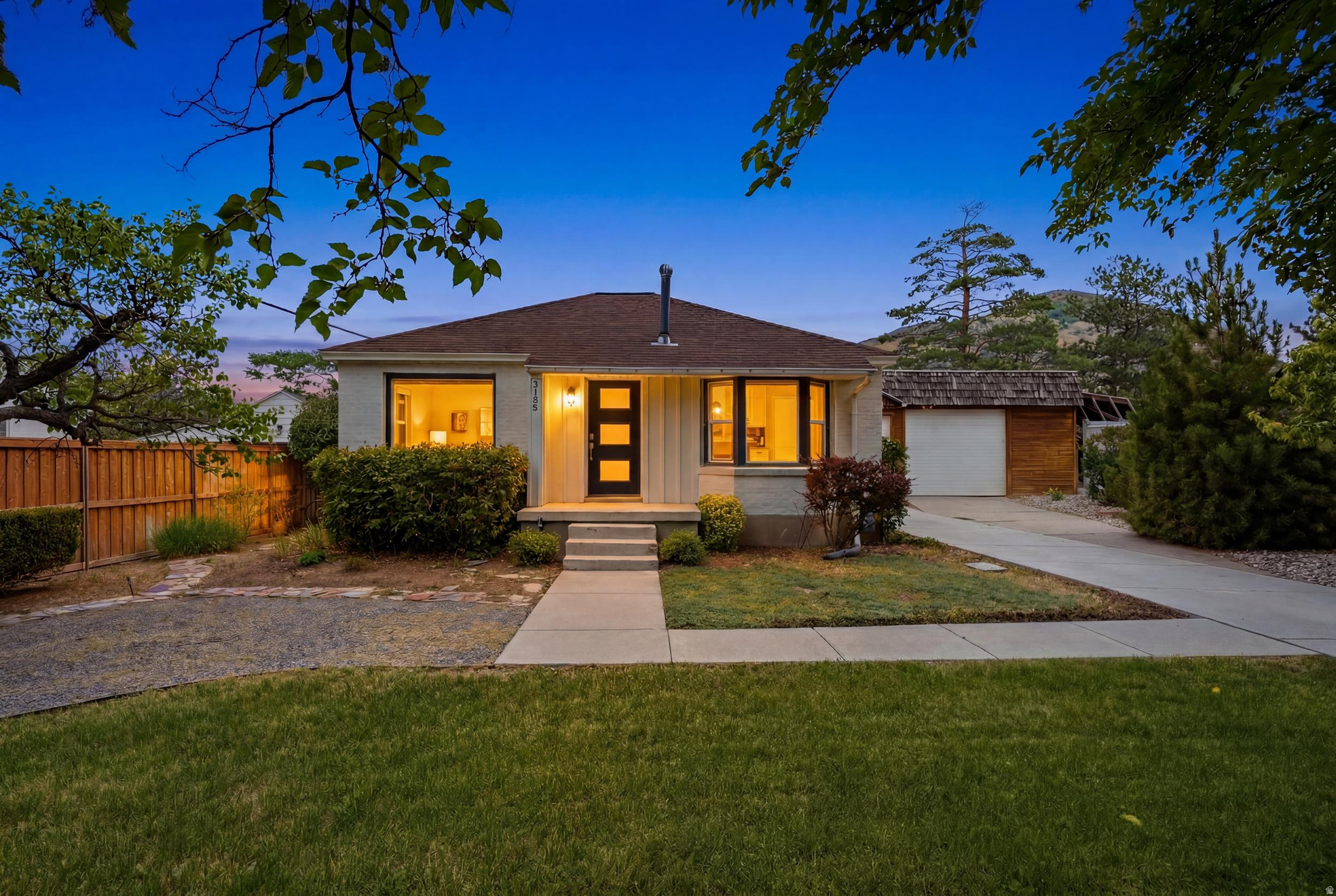 Tucked into the heart of Millcreek's coveted Canyon Rim neighborhood, this beautifully updated 2-bedroom, 2-bathroom home offers the perfect blend of comfort, character, and everyday ease. From the moment you arrive, you'll feel the warmth of a home that's been thoughtfully cared for and refreshed for its next chapter. Inside, updated finishes create a bright, move-in-ready feel throughout, while major systems have already been taken care of for you, including a newer roof and HVAC system, giving you true peace of mind for years to come. Step outside to your own private escape: a generous backyard framed by stunning mountain views, anchored by a cozy covered patio that's ready for morning coffee, evening entertaining, or simply unwinding after a long day. The expansive lot offers plenty of room to garden, play, or just enjoy the fresh Wasatch Front air. For hobbyists, car enthusiasts, or anyone who needs serious storage, the oversized garage is a rare find, complete with multiple workbenches and ample space for projects, toys, or extra vehicles. All of this in one of Millcreek's most sought-after locations, offering easy access to Canyon Rim's tree-lined streets, nearby parks and trails, and a quick commute to both downtown Salt Lake City and the mouth of Millcreek Canyon.