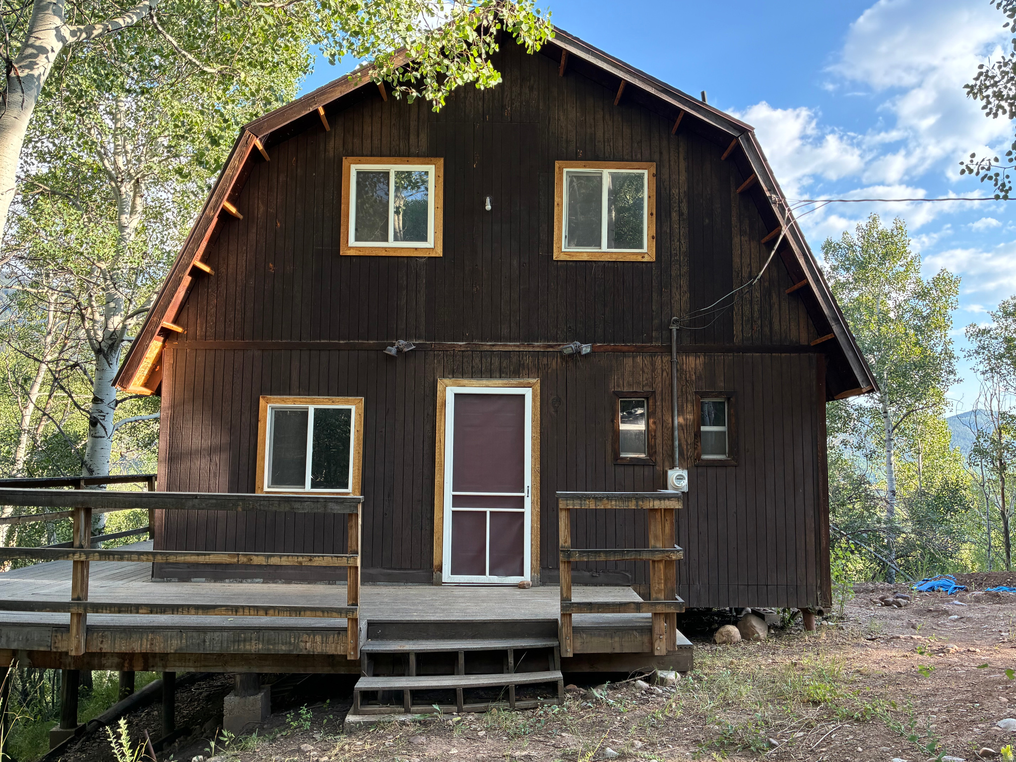 The views are extraordinary! Sit out on the large deck overlooking pasture land & grand mountain tops on your 1.22 acre forested parcel. Enjoy cooking in the new kitchen complete with granite countertops. Share dinner with family and friends while looking out the wall of windows. It is a quick get away with Oakley Diner 17 minutes down the road. This is an outdoor family's paradise with Smith and Morehouse reservoir 15 minutes away, great hiking, snowmobiling, and side by side riding. Beaver Springs Ranch Lot 89