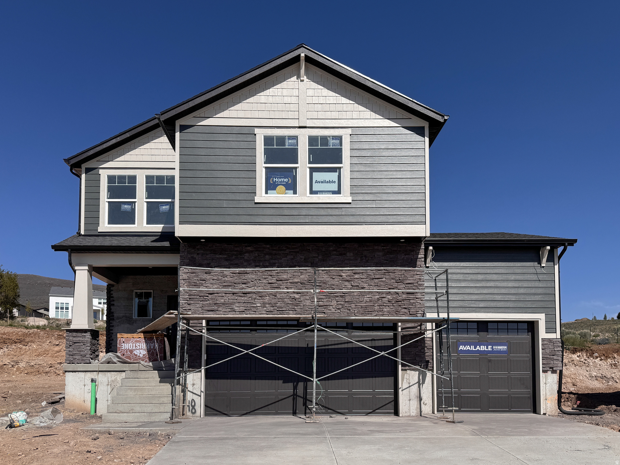 The Clover at the end of the cul-de-sac is a two-story home that offers 3 bedrooms, 2.5 bathrooms, a loft, and a rare 3-car garage with a functional and open main floor layout. Interior features include quartz countertops, laminate flooring, modern cabinetry, a walk-in pantry, and a convenient mud room off the garage. Upstairs includes a spacious loft, laundry room, full bath, and a large primary suite with walk-in closet and private bath. The home also includes an unfinished basement with space for future ADU or extra living. Home comes with a Smart Home Package, radon system, and builder warranty. Actual home may differ in color/material/options. Pictures are of finished homes of the same floor plan and may contain options/upgrades/ decorations/ furnishings not available at the advertised price. No representation or warranties are made regarding school districts and assignments; conduct your own investigation regarding current/future school boundaries. Buyer to verify all information.