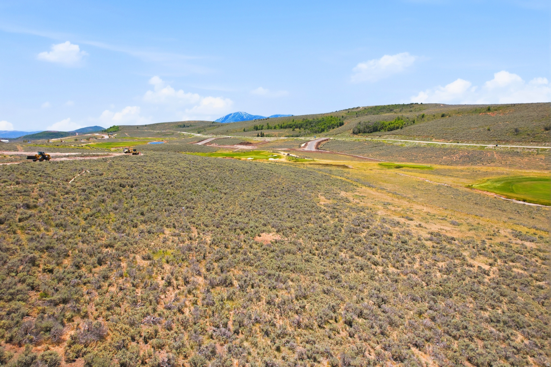 Hawks Pass Estates, a limited collection of eight estate homesites ranging from 1.00 to 2.18 acres. Whether you choose to build a custom home or take advantage of the Lifestyle Designed semi-custom building program offered by Promontory HOMES, this is a rare opportunity to secure a premier homesite in this exceptional neighborhood. Hawks Pass Estates is nestled in the scenic Painted Valley, overlooking fairways on the back nine of the signature Jack Nicklaus Golf Course, and conveniently located close to Promontory's newest entrance. This new access point provides easy entry to Deer Valley East, part of an unprecedented ski expansion that brings world-class slopes closer than ever. Set against the breathtaking Deer Valley and Park City mountains, Hawks Pass Estates offers convenient access to the Nicklaus Clubhouse, featuring The Peak restaurant, a fully equipped fitness center, and The Spa at Promontory. At the heart of the neighborhood, a planned community park creates a serene, community-focused environment. Discover this rare opportunity to join this exceptional neighborhood, where natural beauty meets refined living.