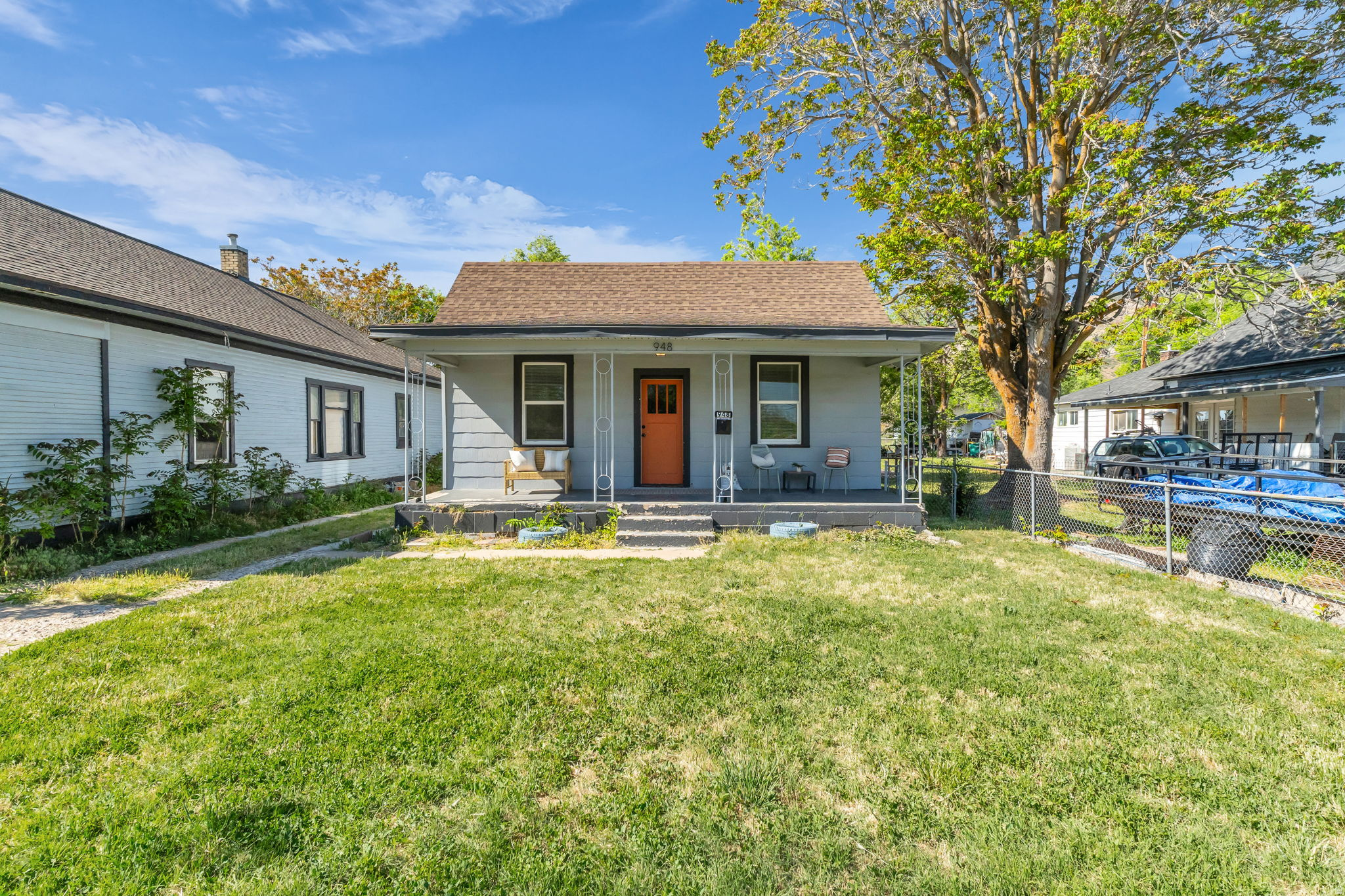 *GRAND OPENING THIS SATURDAY, MAY 30TH 11AM TO 2PM!* Welcome home to this affordable Ogden single-family property offering comfort, practicality, and hard-to-find value. Situated on a lot with mature trees, this 3-bedroom home features a shared driveway to a detached garage all your own, additional storage space in both the garage and unfinished basement, and a backyard deck great for relaxing or entertaining. Inside, you'll find an efficient layout that feels warm and functional. Major mechanical updates bring peace of mind, including a newer furnace and a roof in great condition. Whether you're looking for your first home, a property with room to personalize over time, or an attainable single-family option in today's market, this home offers an opportunity that's becoming increasingly rare in Utah.
