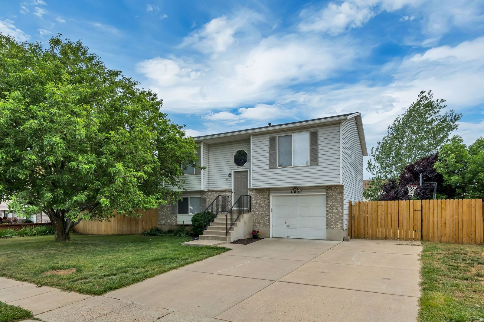 Mostly NEW !!  Completely remodeled and updated.  Fresh, clean, and ready to be your Home Sweet Home.  New Trex deck overviewing large fenced yard.  RV parking, Patio. New LVP flooring and carpet, quartz countertops, new appliances, fixtures and lighting.  Newer roof.  Deep garage. Completely turnkey.  Nice quiet neighborhood near elementary school.  You will have all the advantages of an established neighborhood and a nearly new home.  Owner/Agent.   Square footage figures are provided as a courtesy estimate only and were obtained from tax records.  Buyer is advised to obtain an independent measurement.