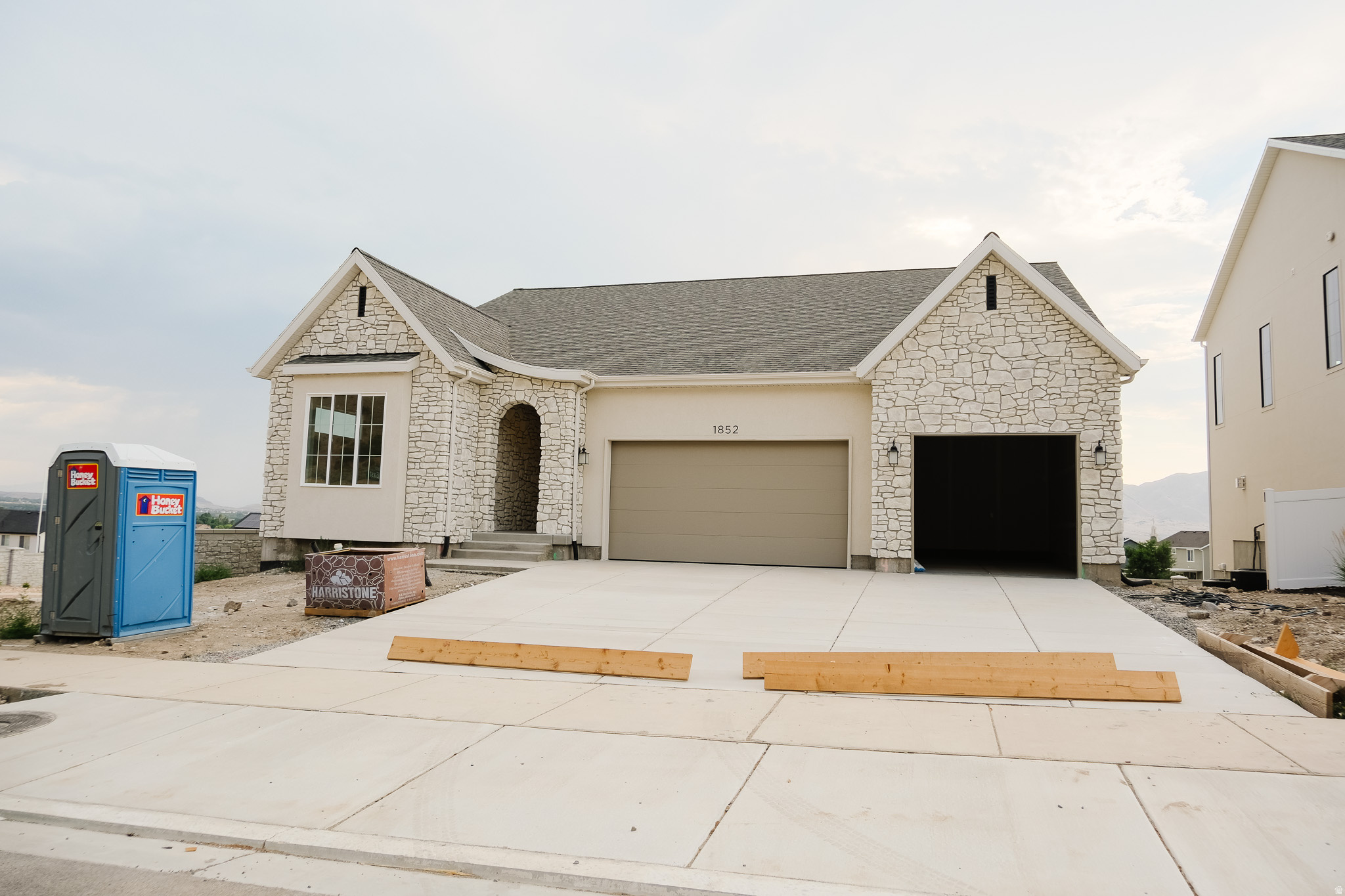 Model Home (1864 S 100 E Payson, UT) OPEN Tuesday & Thursday 4pm-7pm, and Saturday 10am-1pm ** Introducing the first ever "Leah" floor plan, an exciting new rambler design offering the perfect blend of functionality, style, and location. This thoughtfully designed home features 5 bedrooms and 3.5 bathrooms, with 3 bedrooms conveniently located on the main level. The partially finished basement includes 2 additional bedrooms and a full bathroom, with room to expand or customize the remaining space to fit your needs.  Situated on a desirable corner lot, the property offers partial landscaping and fencing, giving you a head start while leaving room to make it your own. Enjoy stunning Payson Valley views from the backyard and beautiful mountain views from the front.  Located just minutes from Payson High School and historic Main Street, you'll have quick access to local amenities, schools, and small town charm. Don't miss your opportunity to own the debut of this brand-new floor plan in a prime Payson location! Estimated completion date is July 14