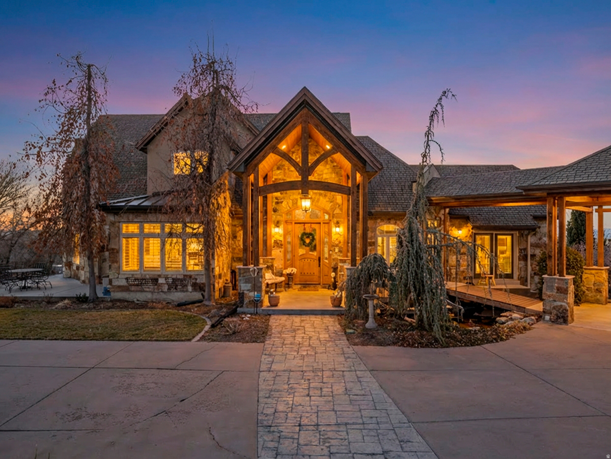 Mohogany Ridge  0.96-acre estate lot  3 distinct living areas with ADU  Walkout basement separate entrance  Heated pool and hot tub  Lake, valley and mountain views  Owned solar  Set on nearly an acre in Mohogany Ridge, 861 N 1100 E in Pleasant Grove offers panoramic lake, valley, and mountain views and a rare level of flexibility with three distinct living areas, including an ADU and a separate-entrance walkout basement. Natural light fills the open main-level living spaces through expansive windows, anchored by a vaulted great room with wood-beam ceiling. The chef's kitchen highlights custom knotty alder cabinetry, High Maxx countertops, and premium appliances including Sub-Zero refrigeration and Wolf gas cooking, plus wall oven, warming oven, microwave, and dishwasher. With three kitchens plus a kitchenette, a sun room with water hookups and drain, and a main-floor office or additional bedroom, the layout supports privacy and ease across the home.  Outside, enjoy a resort-style setting with a saltwater pool, hot tub, pergola-covered patio, BBQ hookups, and multiple decks for dining and entertaining, complemented by a koi pond and waterfall. Well-maintained with a timeless footprint ready for your design vision, this home pairs enduring craftsmanship with room to personalize. Additional highlights include Milgard windows, central vacuum, intercom, soft water, four furnaces, central air, two water heaters, and hot and cold water spigots in the garage. Accessibility features include 36-inch doors and wide hallways. Three lots are included to create the 0.96-acre parcel. Tax ID 46-561-0001(.59 acres) Tax ID 40-062-0016 (0.15 acres) and Tax ID 40-062-0012  (0.22 acres) . Square footage is from an older appraisal and is provided as a courtesy; buyer to verify.