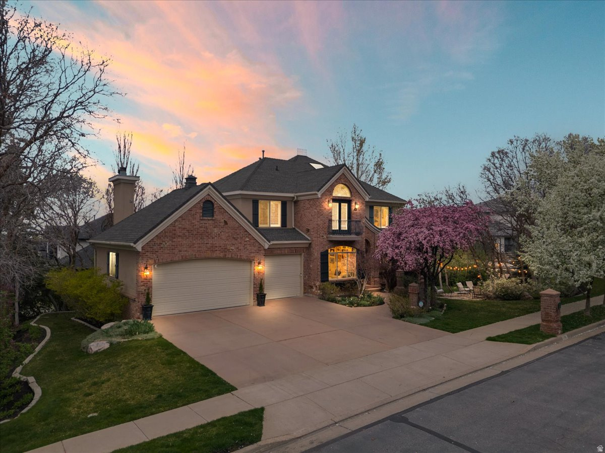 NEW PRICE! Reduced $25k. NOW IS YOUR CHANCE! Located in the highly sought after Eaglewood Cove neighborhood, this charming, updated Country French inspired home, is filled with light, warmth, and timeless appeal. A quick and convenient commute to Downtown SLC, this home features  7 spacious bedrooms and 3.5 baths, providing room for everyone. Rich hardwood floors flow throughout, while two fireplaces add warmth and ambiance. Enjoy formal living and dining rooms, along with large, comfortable gathering areas and a separate den complete with custom built-ins-perfect for working or relaxing at home. The open chef's kitchen is beautifully updated with a Thermador range with double ovens, Thermador side-by-side refrigerator and freezer, Scotsman ice maker, pull-out Sharp microwave, and gorgeous, quartzite countertops. The inviting primary suite is a true retreat, featuring stunning valley views, a luxurious soaker tub, separate shower, and a generous walk-in closet. Enjoy the fully landscaped yard with scrub oak and mature flowering trees, along with a large deck and covered patio-perfect for outdoor living. You won't want to miss this one! This is a truly special home with character and soul.