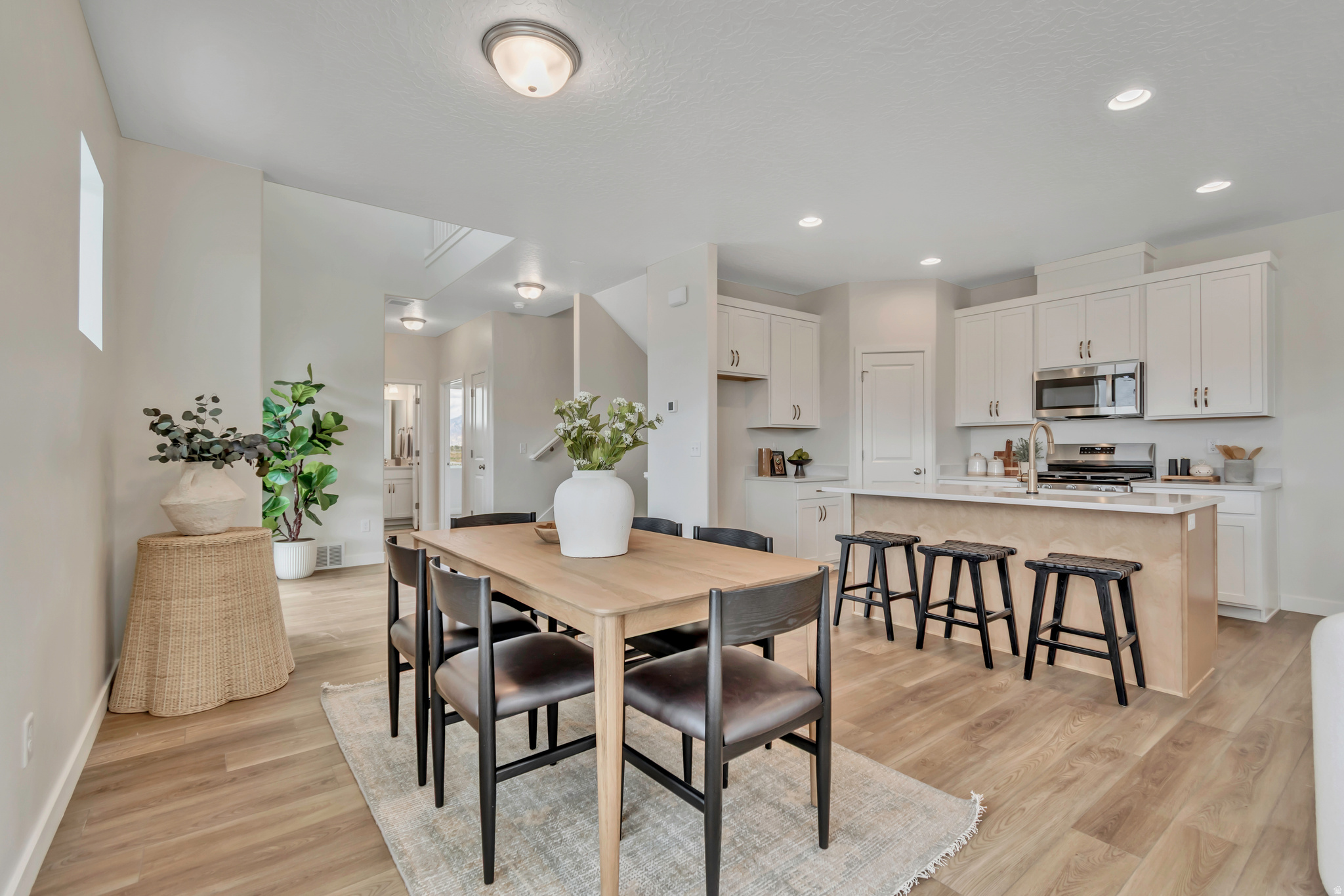 ***Contract on this home today and qualify for one of the 2 special financing options: Option 1: As low as 3.75% on an FHA 5/1 ARM, 3.99 % Conventional 7/6 ARM OR Option 2: As low as 4.5% on a 30-year fixed FHA, 4.875% 30 year fixed Conventional, Restrictions apply: Contact us for more information. Welcome to the Kensington plan in the sought-after Harmony Place community in Salem, where modern design meets everyday comfort. The kitchen is beautifully appointed with premium stainless steel gas appliances, and 42" upper cabinets, offering both function and sophistication. The primary suite is a true retreat with dual sinks and a shower featuring a cultured marble surround. Two additional baths provide convenience and style, each with undermount sinks and quartz countertops. Additional highlights include 9-foot ceilings on the main floor, elegant double doors at the den, upgraded railing on both levels, and an 8-foot garage door. With its thoughtful design, upscale finishes, and inviting spaces, the Kensington plan at Harmony Place is the perfect place to call home.