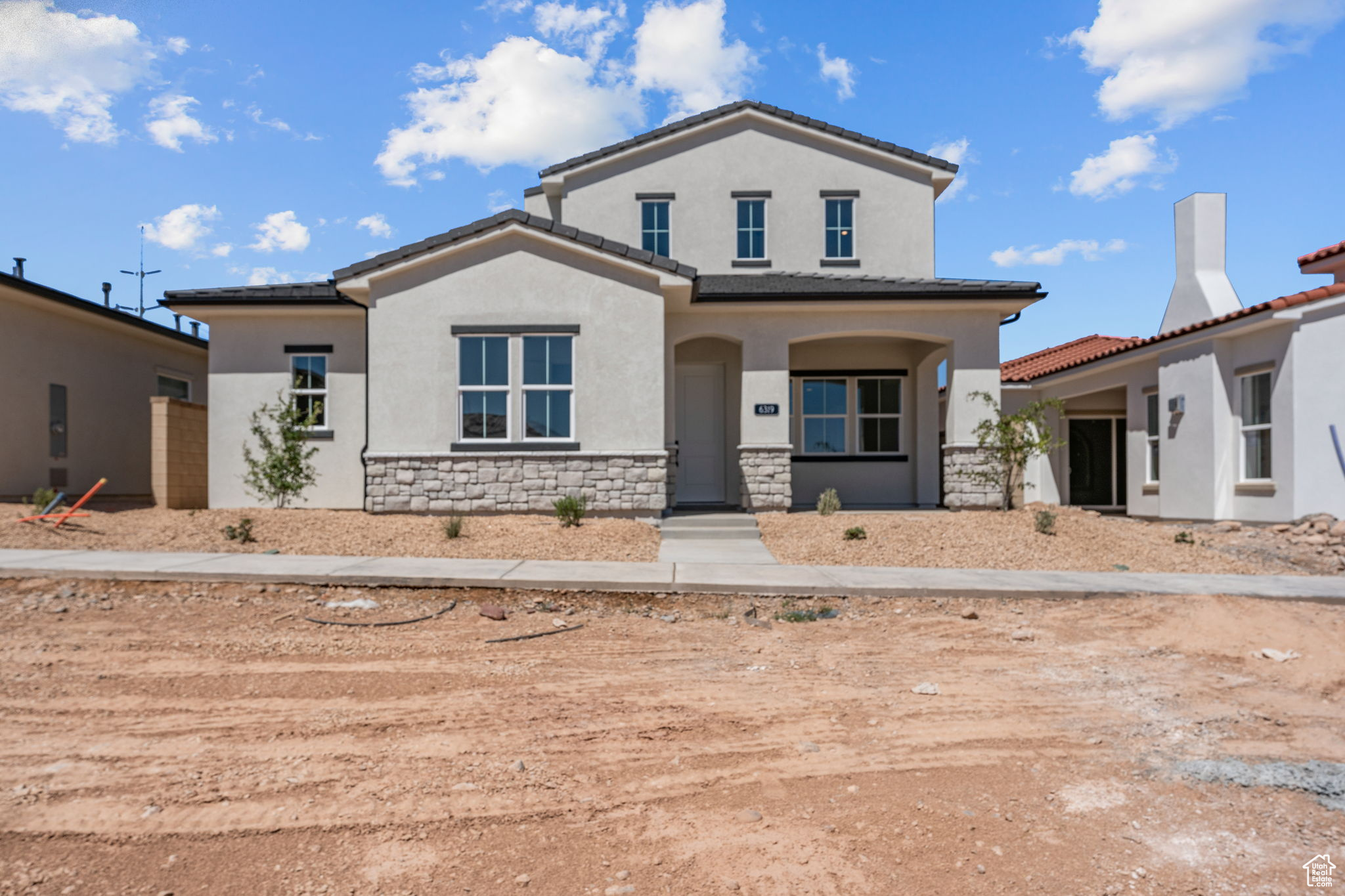 READY MOVE IN TODAY! Come see this stunning Dockside home by Holmes Homes. This home is decked out with premium features throughout and you'll love the Arizona strip view from the upstairs balcony. The dockside features 23 foot vaulted ceilings in the great room, a huge kitchen island perfect for the chef in your family and three covered outdoor spaces to help you enjoy shade, no matter the time of day. Located in the Desert Color neighborhood you'll enjoy access to over 10 miles of paved trail, The 2 1/2 acre lagoon, several pools parks and pickle ball courts. Thoughtfully placed, this home is in the quietest part of Sage Haven near Arizona rural recreation land And will be less than three blocks from the New lizard wash park and future owners only pool. Come see it today!
