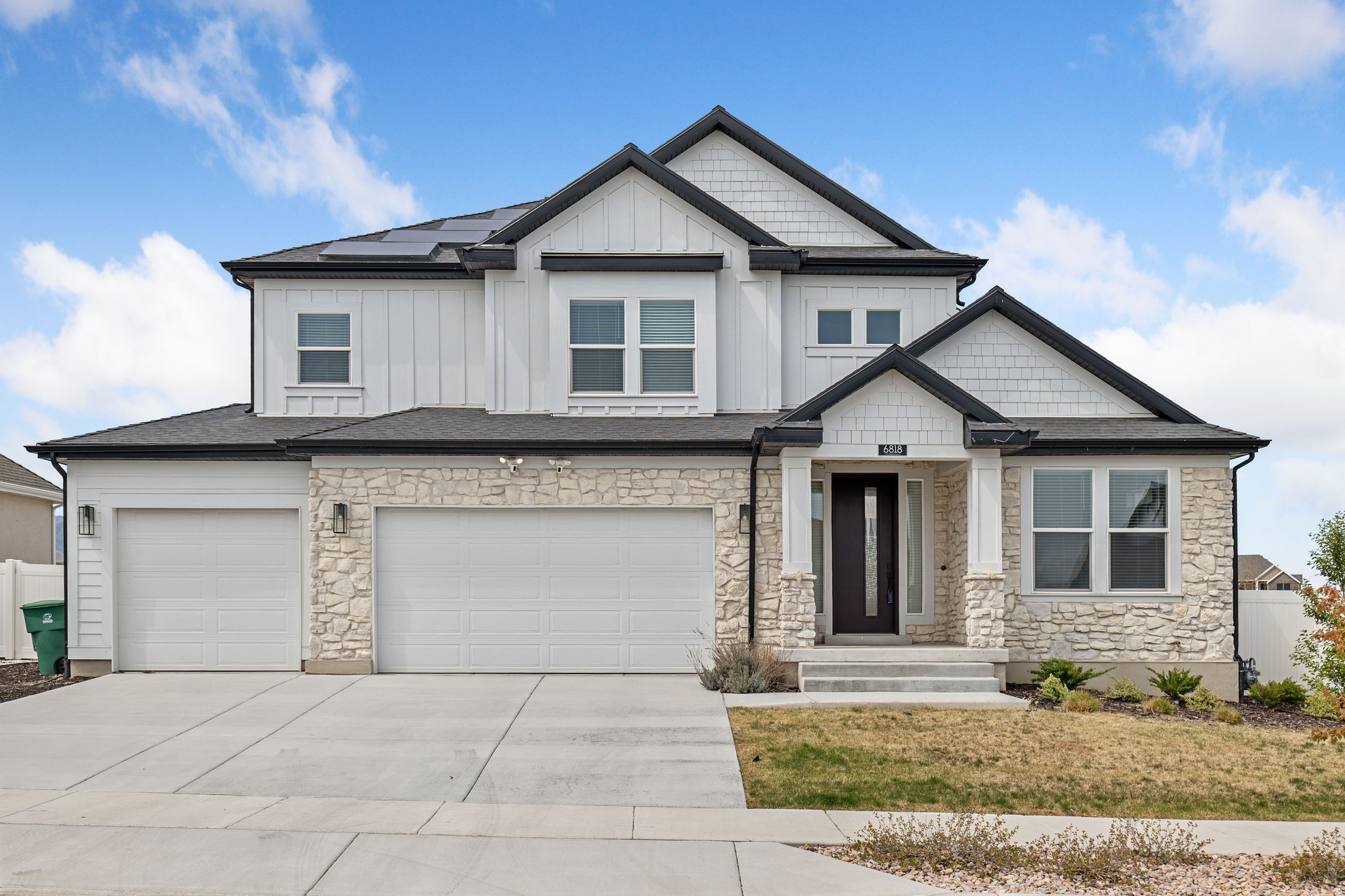 4355 SF; 6 bedrooms, 4 full bathrooms, 2 kitchens, 2 office spaces, 2 living areas, 1 loft, 3-car garage, pergola/gazeebo, private wide basement entrance; $42k SOLAR panels, $95k finished basement; $35k fully finished backyard, fenced, and with auto-sprinklers system.  This Ivory-SIGNATURE home with Montclair floor plan of 4355 SF is feature rich with upgrades, quartz countertops throughout the gourmet kitchen and quartz bathrooms. Home has a fully finished mother-in-law apartment and exceptional flexibility for modern living. This beautifully maintained property features a $95,000 fully finished basement with its own private wide entrance, full kitchen, two bedrooms, family room, office room and full bathroom-ideal for multi-generational living, guests, or strong rental income potential.  Main level offers an inviting open-concept layout, with gourmet kitchen, SMART refrigerator, smart thermostat and already installed RO system. A private office space off the entry provides a quiet, functional workspace for remote work or study. Moreover, bedroom and full bathroom on the main floor provides great convenience.   Primary master-suite is located on the top floor along with a loft, two bedrooms, additional full bathroom, and a laundry room. Throughout the home, you'll find quality upgrades and thoughtful finishes, delivering both style and durability.  Located in a highly desirable Herriman neighborhood within the Jordan School District, this home is just minutes from parks, schools, and daily amenities-making it an ideal blend of convenience and lifestyle. Added bonus: potential for a second driveway on the left side, offering additional parking.