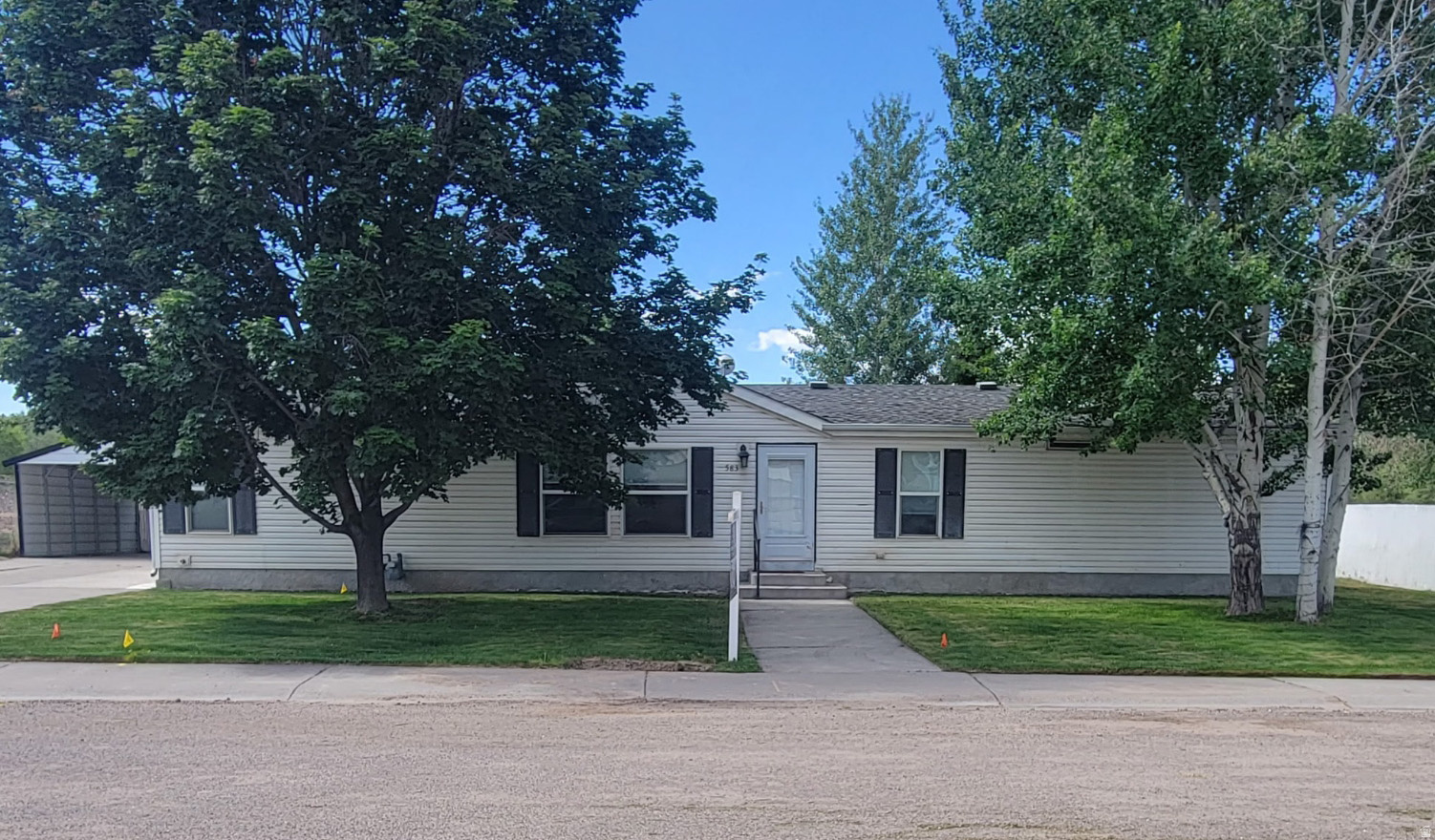Price enhancement AND Seller is offering $10k Buyer incentive to use towards an interest Buy-Down, for your down payment, OR to simply reduce the purchase price. Enjoy the comfort of space and the ease of single-level living in this inviting 4-bedroom, 2-bath home located in a quiet neighborhood setting. Vaulted ceilings and an open layout create a bright, welcoming atmosphere, enhanced by new LVP flooring and two spacious living areas - including a cozy family room with a gas fireplace. The generous primary suite offers a relaxing retreat with a deep soaking tub and separate shower, while three additional bedrooms provide flexibility for family, guests, hobbies, or a home office. The range, refrigerator, and blinds are new, making this home move-in ready. Step outside to a fully fenced .28-acre yard with plenty of space for pets, play, or gardening. The large covered patio creates the perfect spot to unwind, entertain, or simply enjoy peaceful evenings at home. A 2-car carport adds everyday convenience and the two sheds offer plenty of storage. Come see the comfort, space, and easy lifestyle this home has to offer.