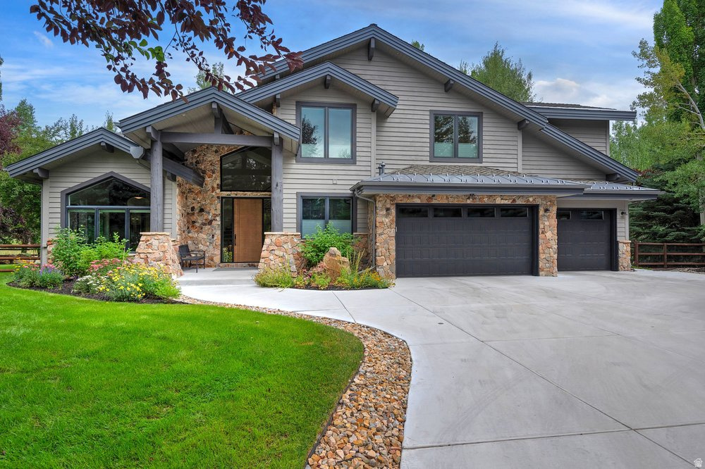Completely Reimagined Modern Retreat in Ranch Place. Set on a private 0.41-acre lot in coveted Ranch Place with direct access to the neighborhood's beloved trail system, this home has been transformed through an extensive 20242026 renovation that touched nearly every surface and system. The result is a 4 bedroom, 5 bathroom home offering 4,735 square feet of thoughtfully reconfigured living space, including two offices, gym/flex room, and a light-filled sunroom, all within the acclaimed Park City School District and just minutes from Parley's Park Elementary. Inside the home boasts vaulted ceilings with custom paneling, white oak flooring, and designer lighting and finishes. The gourmet kitchen features a Wolf 48" range, Wolf steam oven, two dishwashers, a large island with prep sink, a hidden pantry, and a wraparound full-height marble backsplash. Custom built temperature-controlled wine storage and stone fireplace surround elevate the main living areas, while the fully remodeled upstairs adds two new bathrooms, custom wardrobes, and a redesigned primary suite with fireplace, private office, curbless European shower, soaking tub, and custom walk-in closet. The outdoor living is exceptional with an Endless Pool swim spa, Bullfrog spa, two new rear decks, fire pit, in-ground trampoline, and all-new landscaping within a fenced backyard backing to open space. Winter is effortless thanks to a radiant-heated driveway, walkways, and a PowderWatts AI-enabled roof snowmelt system.  Other notable features include rooftop solar with battery backup, 400-amp electrical service, Lutron RadioRA 3 lighting, whole-house humidifier, water filtration + RO, fiber internet, and a heated 3-car garage with epoxy floors, two EV chargers, and extensive storage. New roof, windows, doors, furnace, and full interior/exterior repaint complete the package.  From the trail out the back door to the last finish detail, this fully renovated home is a rare opportunity in one of Park City's most sought-after neighborhoods.