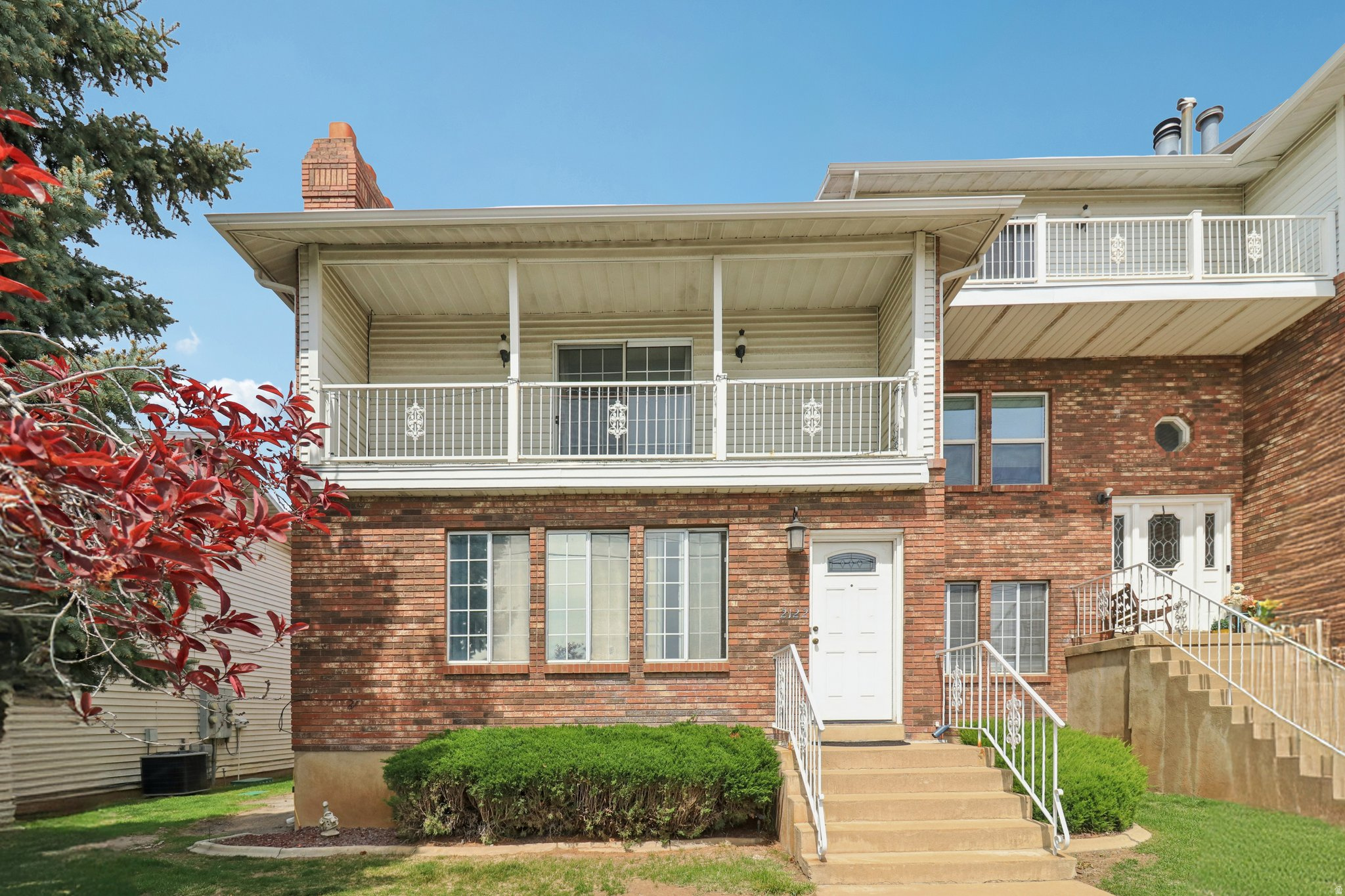 !!! PRICE REDUCED !!! Spacious, stylish, and exceptionally versatile-this standout townhome in Roy offers over 2,700 square feet of living space, delivering the feel of a single-family home with the convenience of low-maintenance living. With 5 bedrooms, 2.5 bathrooms, and multiple living areas, there's room here for everyone to spread out, gather, and truly live. The main level welcomes you with an open, functional layout anchored by a well-appointed kitchen that flows seamlessly into both formal and casual living spaces-perfect for entertaining or everyday comfort. Two fireplaces add warmth and character, creating inviting spaces throughout the home. Upstairs, a generous loft provides an additional family room-ideal for a media space, play area, or home office-adding flexibility that's hard to find in this price range. Throughout the home, you'll find generously sized bedrooms offering comfort for family and guests alike, along with ample storage to keep everything organized. Enjoy the added benefit of a 2-car garage and access to community amenities, including a pool-perfect for relaxing during the summer months without the upkeep. Conveniently located with quick interstate access, this home puts you just minutes from shopping, dining, and everyday essentials while still offering a quiet, residential feel. If you've been searching for space, functionality, and value-all in one-this is the one that delivers.
