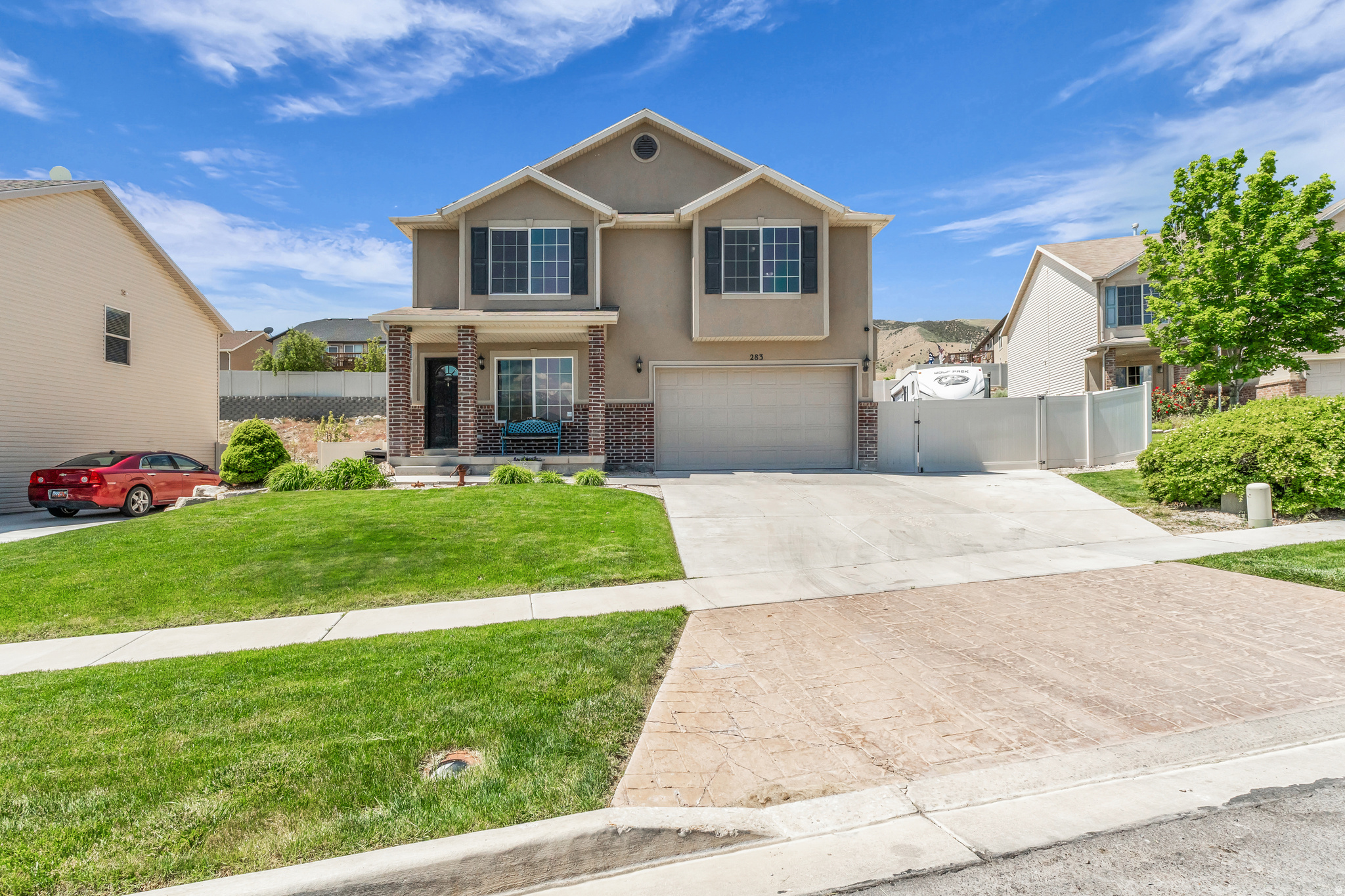 Enjoy breathtaking lake and mountain views from this beautifully maintained, move-in ready two-story home! Featuring 4 bedrooms, 3 bathrooms, and a spacious lot, this property offers plenty of room for both everyday living and outdoor adventure. The oversized RV pad provides ample space to store your RV, boat, trailers, and recreational toys. Step inside to a welcoming front living room that flows seamlessly into the expansive kitchen, complete with abundant cabinet and counter space, a generous dining area, and a large walk-in pantry. The spacious primary suite serves as a private retreat, featuring dual vanities, a relaxing soaking tub, and an oversized walk-in closet. Conveniently located near schools, parks, and walking trails, you'll also enjoy easy access to Pelican Bay Marina, offering a sandy beach, boat docks, and endless waterfront recreation. Outdoor enthusiasts will love the nearby hiking, ATV, and 4-wheeling trails, while commuters will appreciate the quick access to Redwood Road. This home combines comfort, convenience, and adventure-all in one incredible location! Square footage figures are provided as a courtesy estimate only. Buyer and buyer's agent to verify all information.