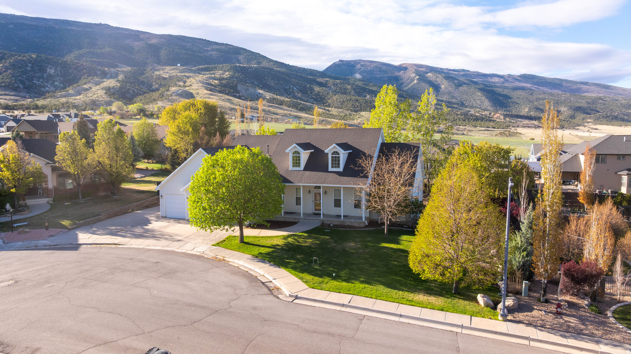 Welcome to this spacious and inviting rambler in the desirable Shingle Mill neighborhood of Ephraim. Offering over 4,700 square feet, this well-designed home features 7 bedrooms and 3.5 bathrooms, providing plenty of space for comfortable living, entertaining, or multi-generational needs. The open layout creates a warm, functional flow with generous living areas and a fully finished basement with a separate entrance.  Situated on a .40-acre lot, the fully fenced yard is beautifully landscaped with mature trees and garden space perfect for those who enjoy outdoor living and gardening. Take in stunning views of the San Pitch Mountains from the large back deck or relax on the covered side patio.  Additional highlights include a 3-car garage with extra width, ample parking, 9 foot ceilings in the basement, and convenient single-level living features. Located in a quiet neighborhood with easy access to local amenities, this property offers the ideal balance of space, comfort, and small-town charm.  **New carpet and flooring throughout the home**
