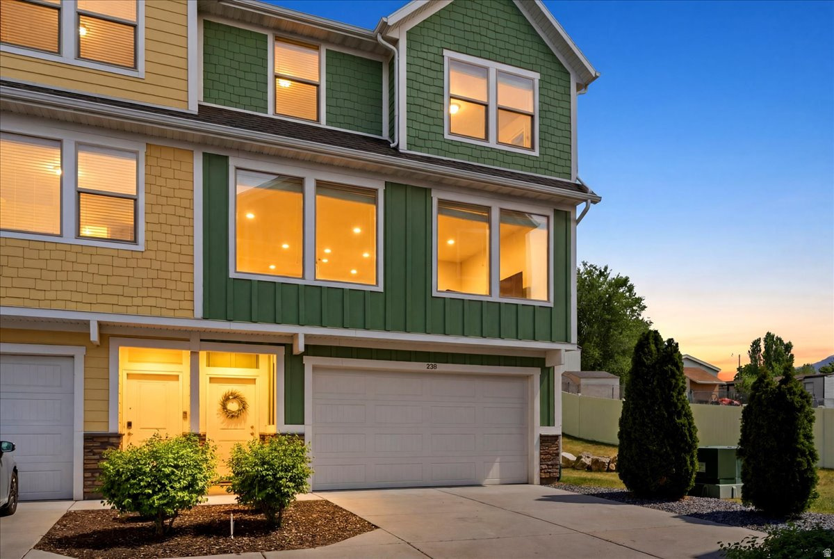 Beautiful end-unit townhome in a great location. Ground level features a large 2-car garage with built-in storage and workbench, tons of storage, utility room and a patio, second level features 9 ft ceilings, a very spacious kitchen and family room, half bath, and Trex deck. Stainless steel appliances and under cabinet lighting in the kitchen. Granite countertops throughout. Third level features good-sized bedrooms including a master suite with walk-in closet and double vanity in the bathroom, main bathroom, and laundry room. End-unit means no neighbors on one side with open space right outside your door. Just minutes from shopping, schools, and parks! Sq. footage per previous listing. Property facts provided as a courtesy; Buyer to verify all information.