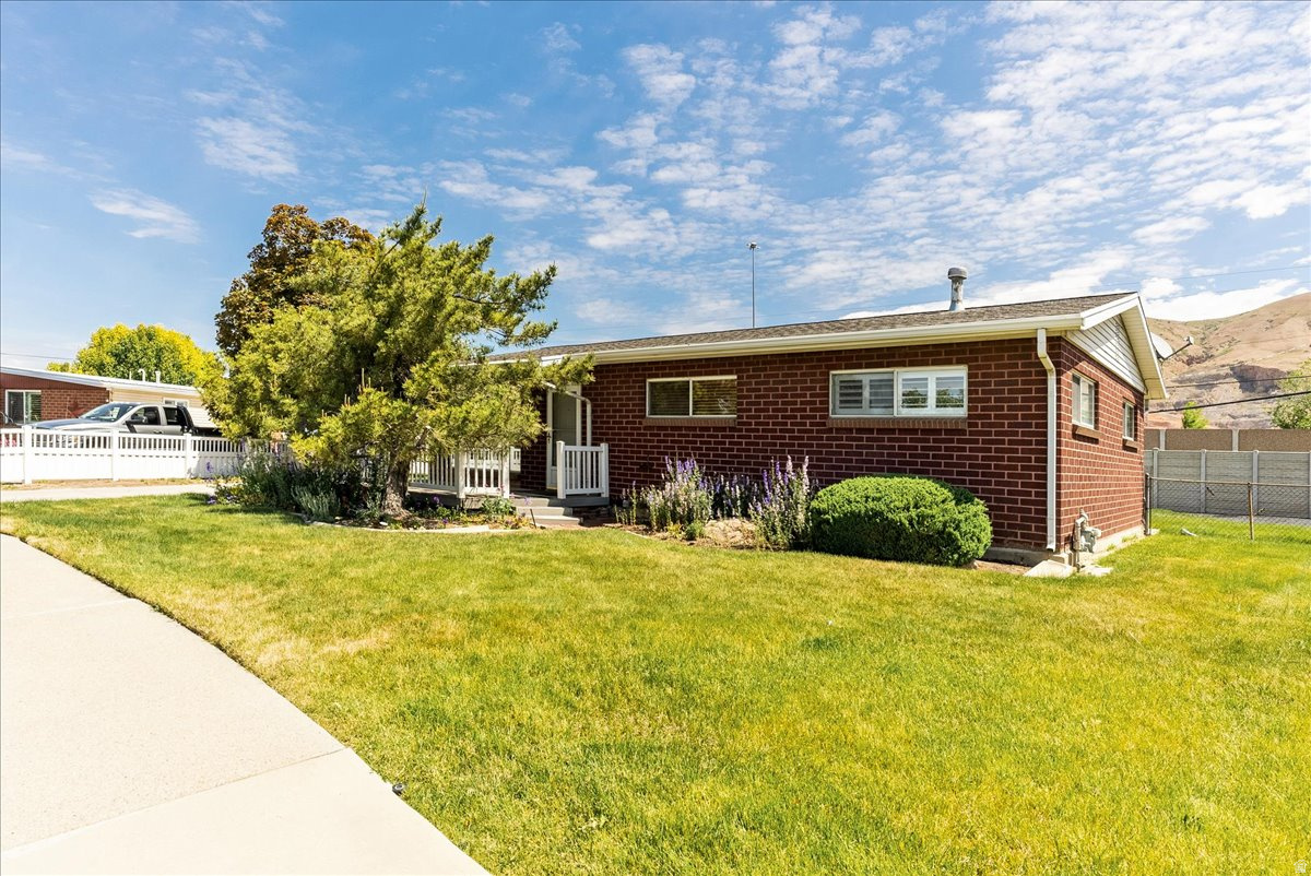 Welcome home to this charming, well-maintained starter home in the heart of a revitalizing Salt Lake City neighborhood!  With just over 1,100 square feet, this adorable home features 3 bedrooms, two fully updated bathrooms and brand new carpet, paint and laminate throughout.  Plantation shutters add a touch of eleaance while the oversized garage and carport provide ample space.  The large, beautifully cared-for yard includes room for a vegetable garden.  Nestled in an up-and-coming area, this home offers both charm and exciting future potential - don't miss your chance for an affordable home in this thriving community.