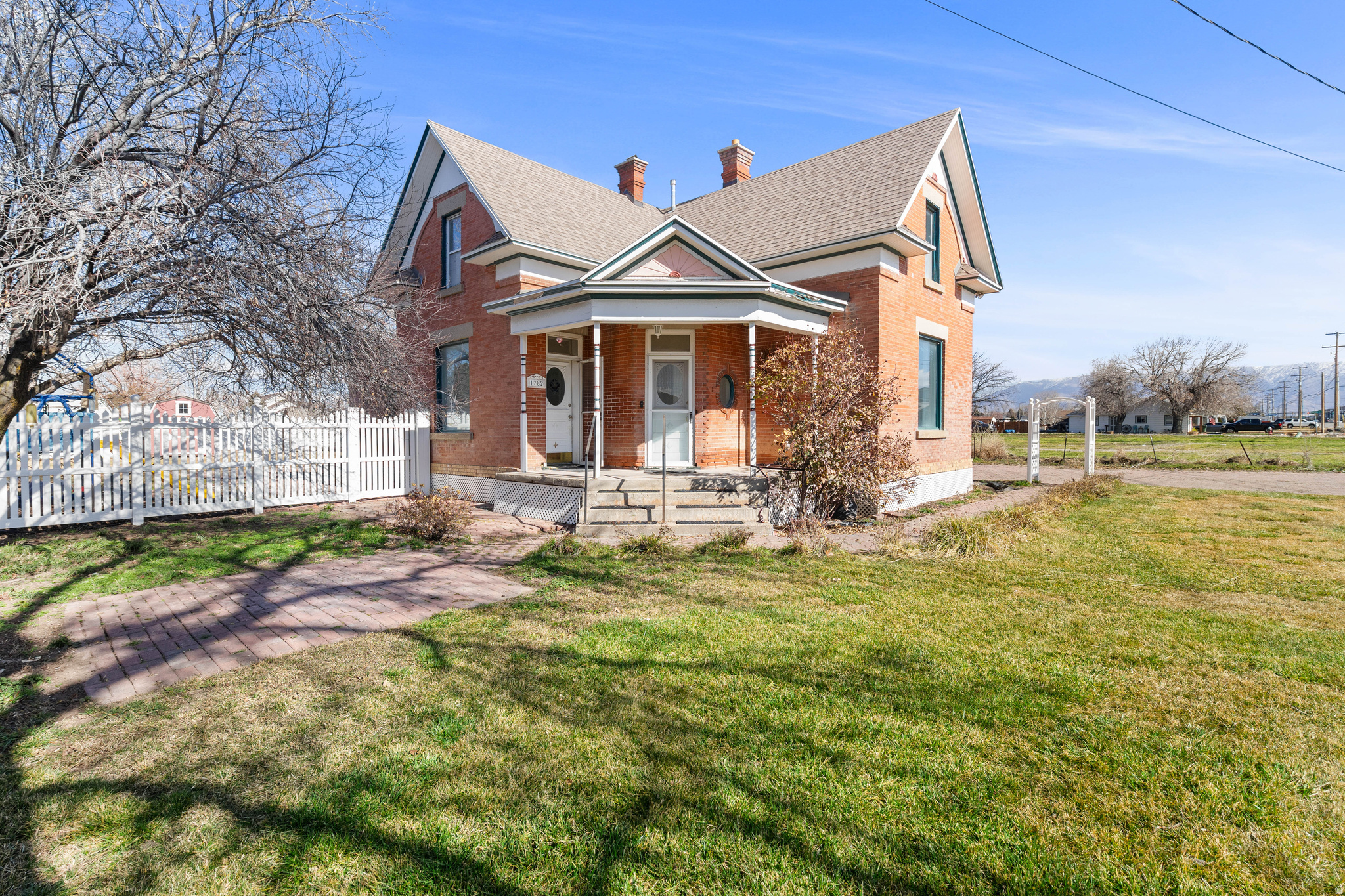 Remarkable Opportunity in Syracuse!  Discover a unique property that seamlessly blends history and potential!  This stunning Victorian-style home, built in 1910, stands out not only for its architectural charm, but also for the exceptional opportunity it presents.  Located in a prime area, it offers high visibility and accessibility, making it a coveted asset in Syracuse's thriving commercial landscape.  This property can be remodeled to suit your specific vision, whether it is for residential or commercial use.  Don't let this chance slip away-embrace the possibilities that await!  Please note: home is sold "As-Is", all information provided is deemed reliable but not guaranteed.  Buyers and their agents are encouraged to verify all details to their satisfaction.  Driveway constructed of brick pavers. * Possible City RDA funds* Thank you for your interest.