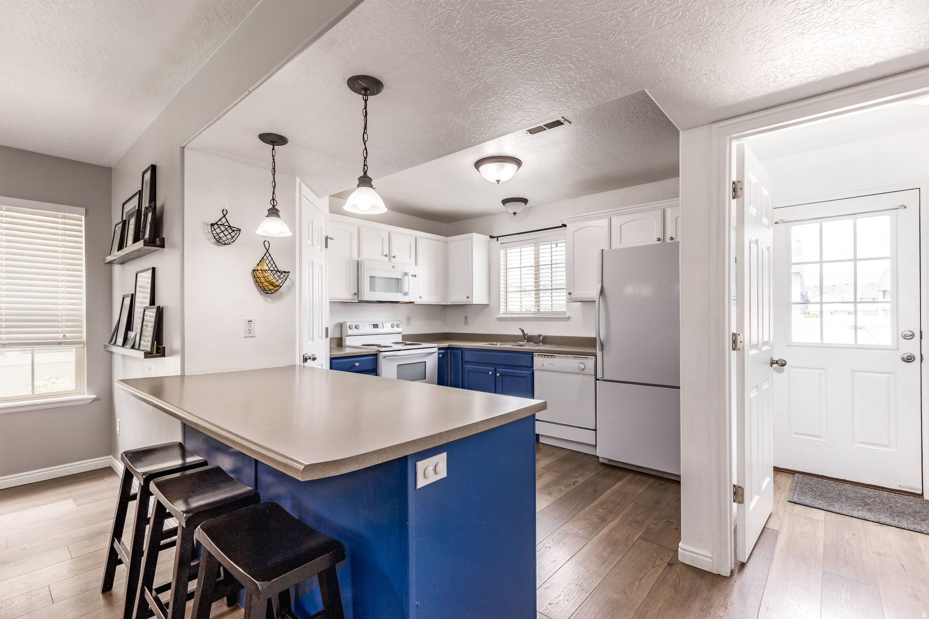 TOWNHOMES AT CAMELOT VILLAGE - Residential