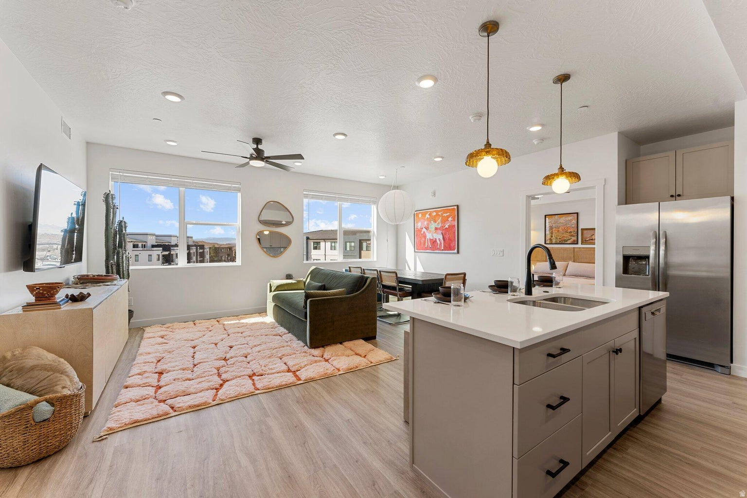 A truly turnkey, fully furnished, and professionally appointed nightly rental designed for effortless ownership and instant income, with everything in place for seamless guest-ready operation! The home features a contemporary design with professionally selected finishes including quartz countertops, custom cabinetry, black plumbing fixtures, modern lighting, and stainless steel appliances.Terra offers an impressive lineup of amenities: RV parking, a swimming/sport pool with beach entry, water slide, lazy river, large hot tub, pickleball courts, BBQ/picnic areas, fire tables, and access to Coral Springs amenities such as a fitness center and indoor pool.Perfectly situated near Quail Creek and Sand Hollow Reservoirs and just a short drive from Zion National Park- ideal for outdoor enthusiast