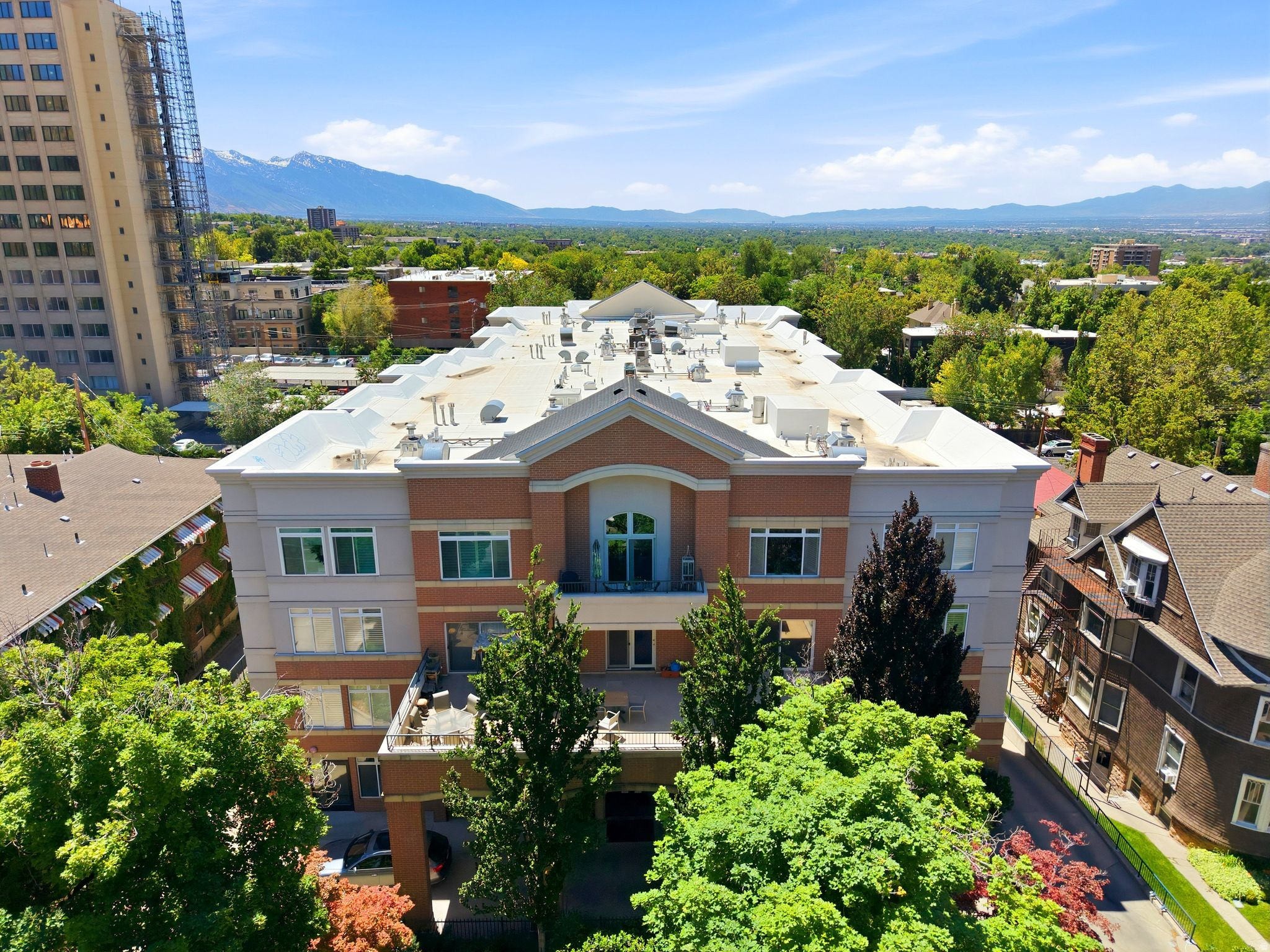 Convenient city living in this beautifully updated main level condo. A secured building with one reserved parking stall offering a personal EV connection. Two spacious bedrooms and two baths with private laundry. Open, functional floor plan. Prime location places you just minutes from downtown shopping, dining, entertainment, parks, coffee shops, public transportation, hospitals and university access. Whether you are a first- time buyer, downsizing, or looking for a low-maintenance lifestyle, this condo offers the perfect blend of comfort, security and convenience.  Dedicated storage located on the lower level, #32.  Square footage figures are provided as a courtesy estimate only and were obtained from appraisal .  Buyer is advised to obtain an independent measurement and to verify all.