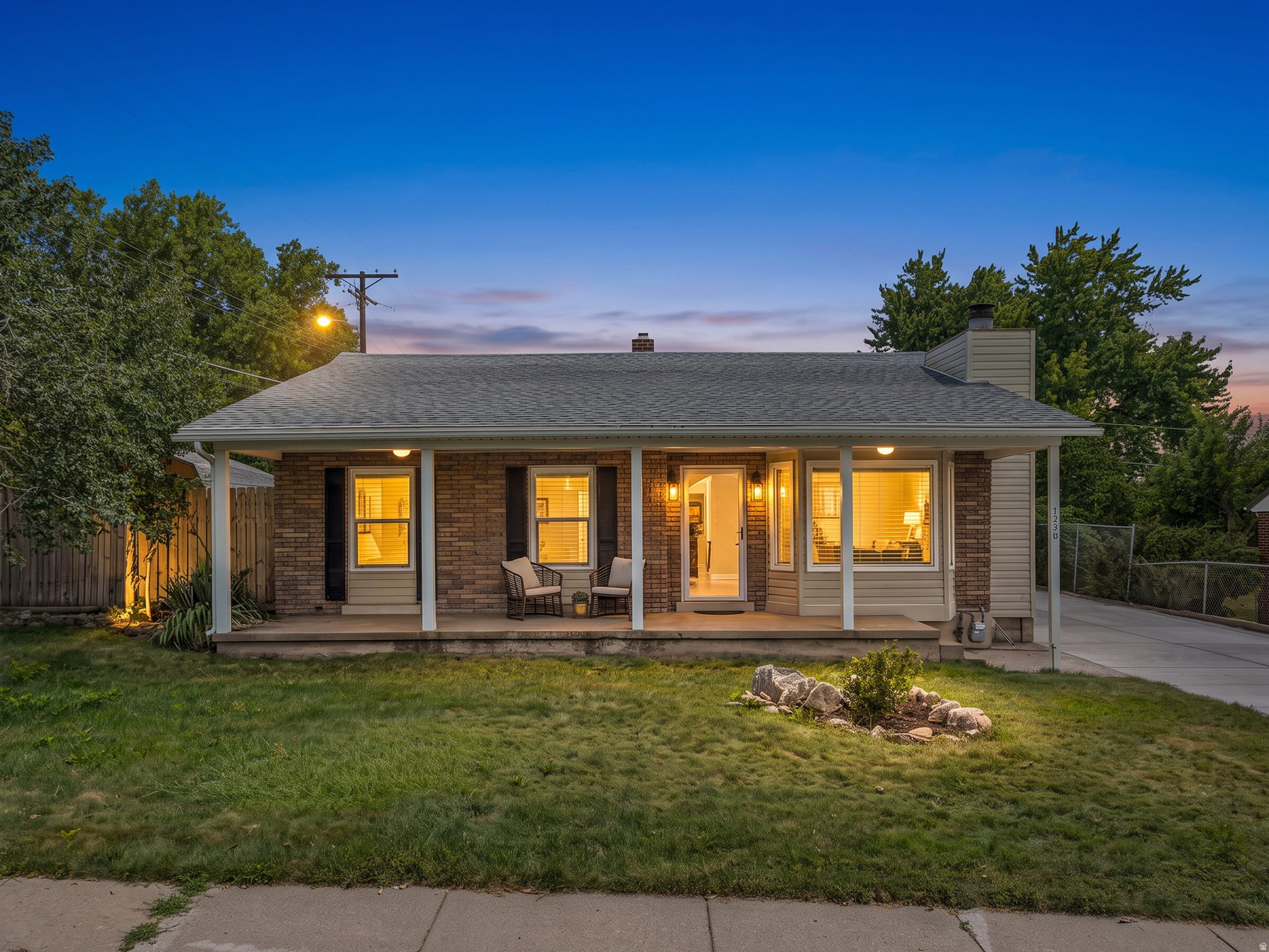 Brand new driveway! Tucked in one of Centerville's most established neighborhoods, this classic red-brick rambler offers nearly 3,000 square feet of comfortable living space, a covered front porch, and the kind of mature landscaping that takes decades to grow. Five bedrooms, a full basement, and a two-car garage give you the space and flexibility modern buyers are looking for, all wrapped in timeless charm. Walk to J.A. Taylor Elementary, the mountain trails Centerville is known for and enjoy easy access to I-15, shopping, and dining. Homes like this don't come around often.