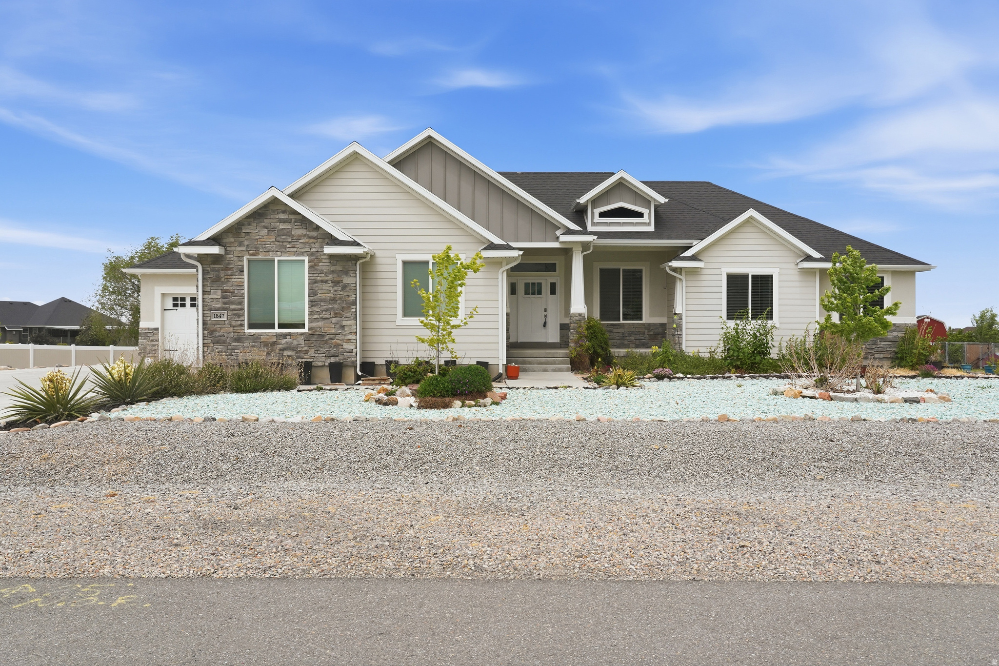 OPEN HOUSE SATURDAY 5/16, FROM 12-2. Discover the perfect blend of luxury, space, and breathtaking scenery at 1547 East Owen Cove in Lake Point. Situated on 1.01 pristine acres in a quiet cul-de-sac, this beautifully maintained 2017-built home offers peaceful rural living just 20 minutes from downtown Salt Lake City and the international airport. With 6 spacious bedrooms, 3 full bathrooms, and an open-concept layout, this home was designed for both comfortable everyday living and effortless entertaining. Large windows throughout capture stunning panoramic views of the Oquirrh Mountains and unforgettable sunsets over the Great Salt Lake. The immaculate front landscaping creates incredible curb appeal, while the oversized 3-car garage provides ample room for vehicles, storage, and outdoor gear. Home is equipped with extended driveway as well as RV parking to accomodate the largest of RV's/5th Wheels. The fully finished basement (fully permitted through Lake Point City) is an entertainer's dream, featuring expansive recreation space with room for a home theater, game room, and full-sized pool table-perfect for hosting family and friends. Outdoor enthusiasts will love the nearby hiking and biking trails, Stansbury Island recreation, and Stansbury Park Golf Course just minutes away. Convenient access to shopping, dining, and highly regarded Tooele County schools adds even more appeal. Experience the rare opportunity to enjoy wide-open spaces, luxury living, and easy city access all in one exceptional property. Square footage figures are provided as a courtesy estimate only and were obtained from county. Buyer is advised to obtain an independent measurement.
