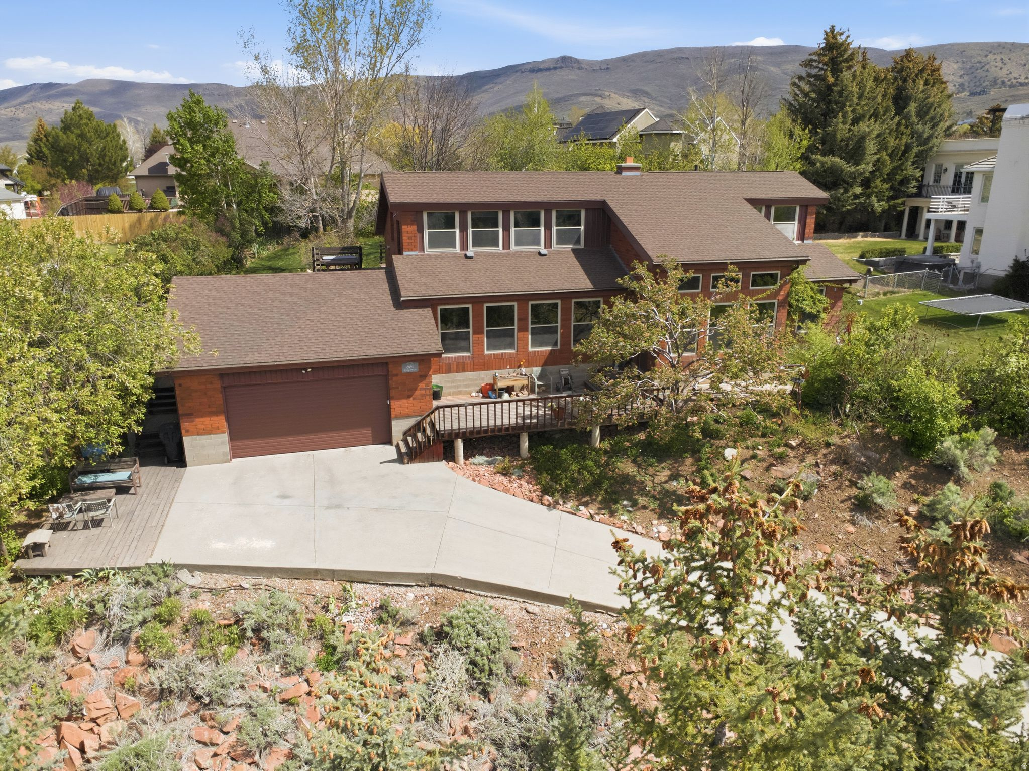 Welcome to a unique 4-bedroom, 2-bathroom home designed with passive solar efficiency and year-round comfort in mind. Perfectly positioned to capture natural light and warmth, this home offers energy-conscious living without sacrificing style or livability. Step inside to a thoughtfully designed layout where large south-facing windows invite in abundant sunlight, helping to naturally heat the home during cooler months. The spacious living areas create an inviting atmosphere for relaxing or entertaining, while the functional kitchen and comfortable bedrooms provide everything you need for everyday living.  The home's passive solar design not only reduces energy costs but also enhances the connection to the surrounding landscape. Outside, enjoy a peaceful setting with beautiful mountain views and space to unwind, garden, or gather with friends and family.  Located in the desirable Heber Valley, you're just minutes from outdoor recreation at Jordanelle Reservoir, world-class skiing in nearby Park City, and endless opportunities for hiking, biking, and fishing.  Whether you're seeking a primary residence, mountain retreat, or eco-conscious investment, this home offers a rare combination of sustainability, comfort, and location.