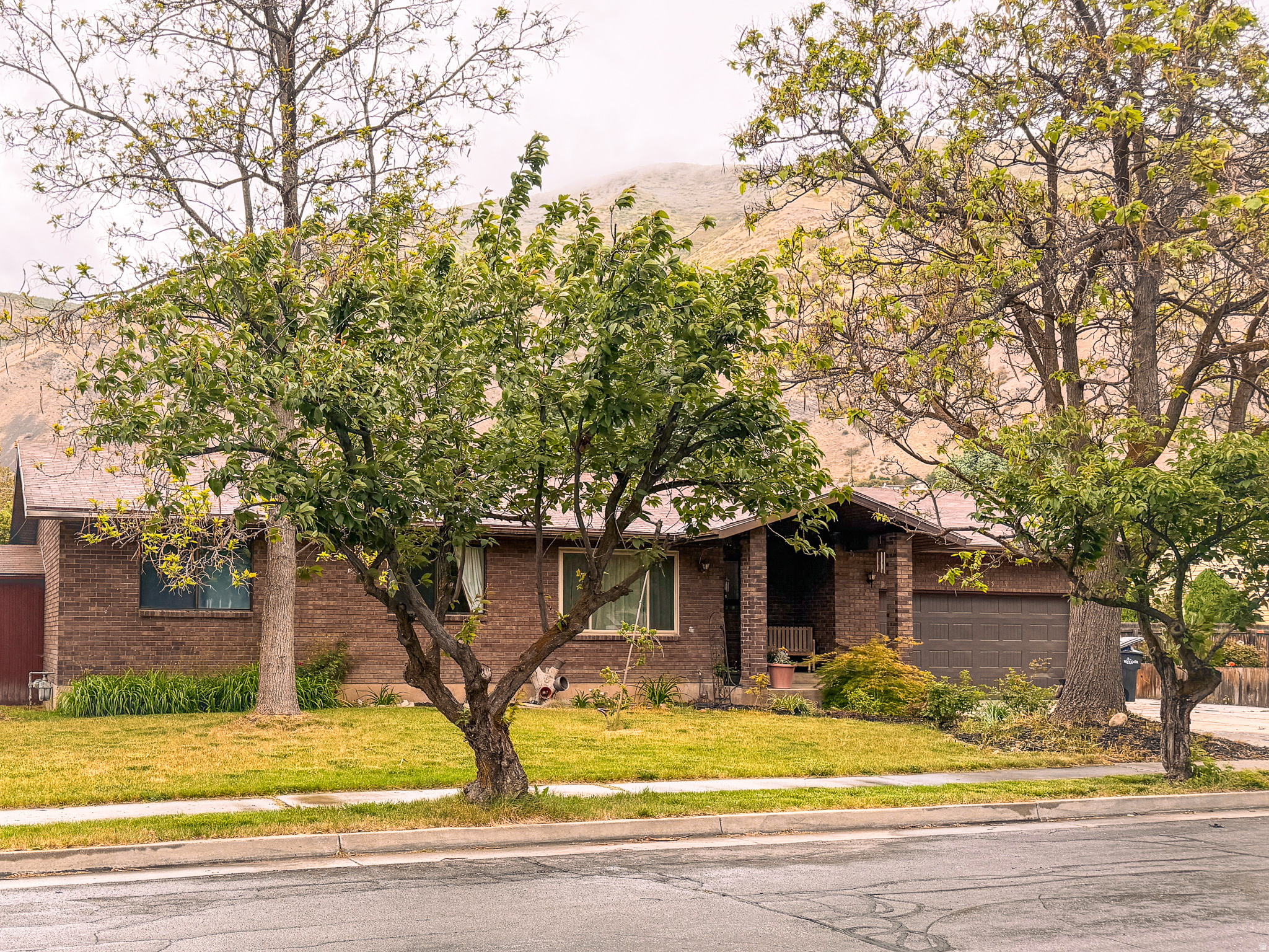 Located in the highly desirable east bench of Springville.  Open floor plan with a large covered deck for entertaining.  New laminant flooring installed on the main floor.  Off the family room is a sunroom with plenty of natural light.  Larger sized bedrooms.  Outside, a generous backyard shaded by mature trees creates a private, park-like setting perfect for relaxing.   *All information provided as a courtesy and should be verified.
