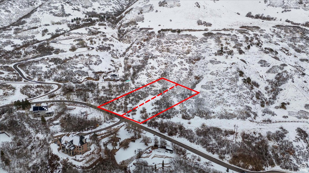 Build your dream home on this stunning one-acre lot in one of Ogden's most prestigious community. Enjoy breathtaking panoramic views of the valley, including the majestic Wasatch Mountains. This prime location offers a rare opportunity to build a luxurious home in a community renowned for its exclusivity and privacy. Surrounded by mature trees and lush landscaping, this lot provides a tranquil setting for your personal oasis. Close proximity to world-class skiing, hiking, and other outdoor activities. Easy access to downtown Ogden and all its amenities. Don't miss out on this once-in-a-lifetime opportunity to own a piece of paradise in Ogden, Utah. Utilities at the curb, ready to build! Bring your own builder or use ours.