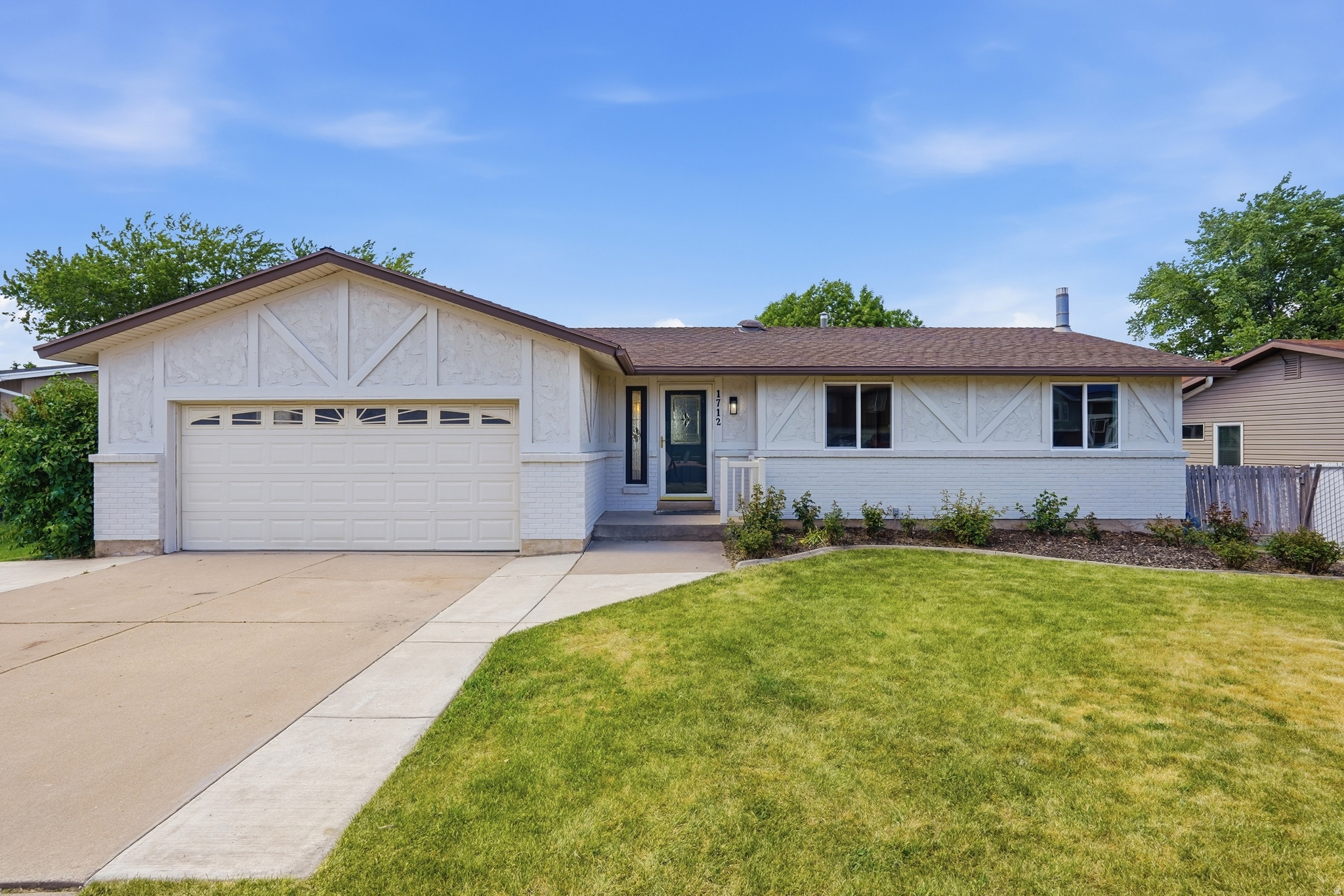 Need a little help with the mortgage? This beautifully remodeled East Layton home offers a fully finished basement apartment with a separate entrance, full kitchen, and its own laundry hookups, perfect for rental income, multi-generational living, or added flexibility. Thoughtfully updated throughout with new kitchens, soft-close cabinetry, solid surface countertops, new bathrooms, fresh paint, lighting, and flooring. The main level features a spacious great room off the kitchen, an additional living room or den, and a large covered deck. Located on Layton's desirable east bench, between Cherry Ln. & Antelope with convenient access to Hwy 89, Hill AFB, parks, trails, shopping, and dining.